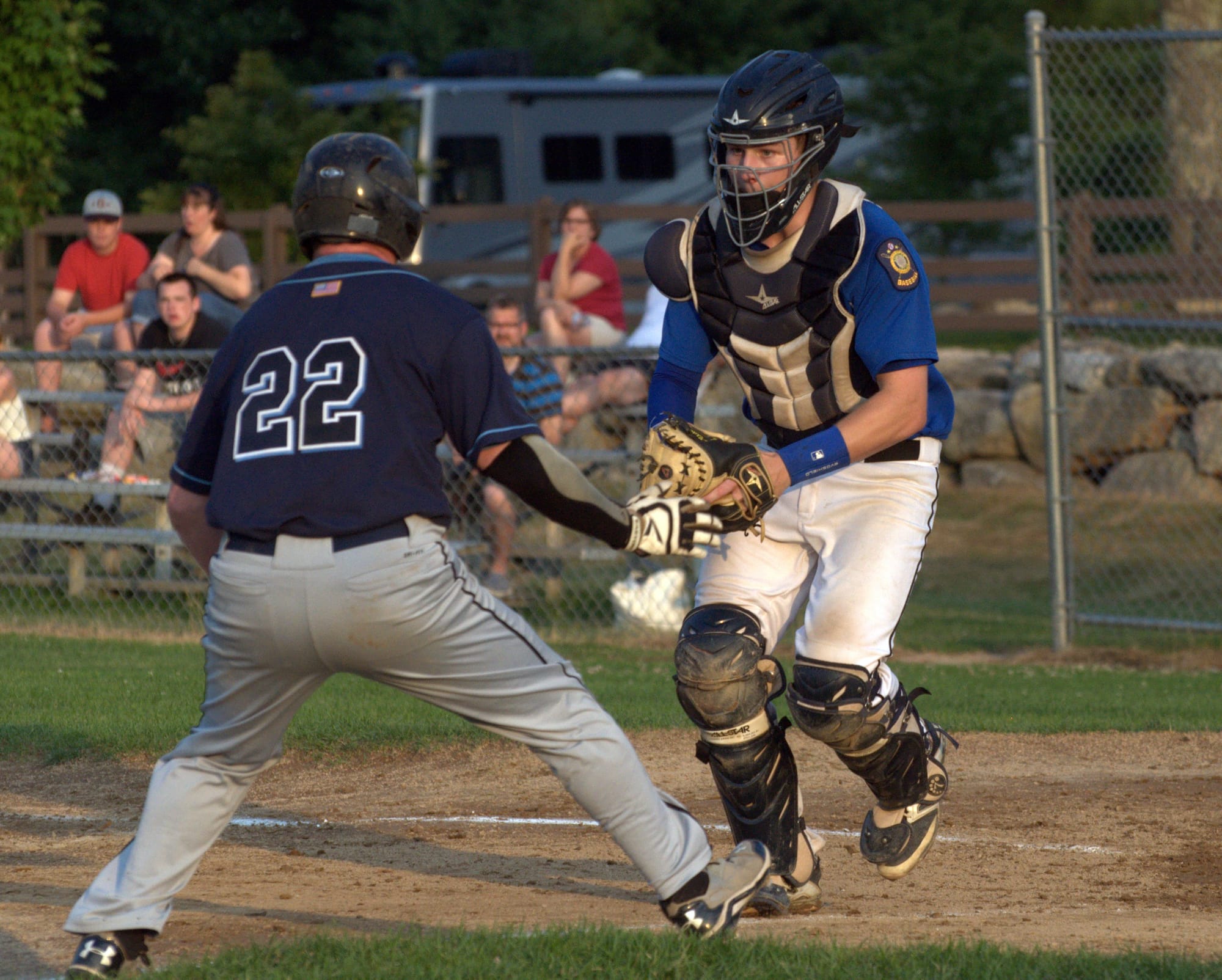 Goffstown's David Nelson waits to tag Bedford's A.J. Schiappa during Tuesday's game.