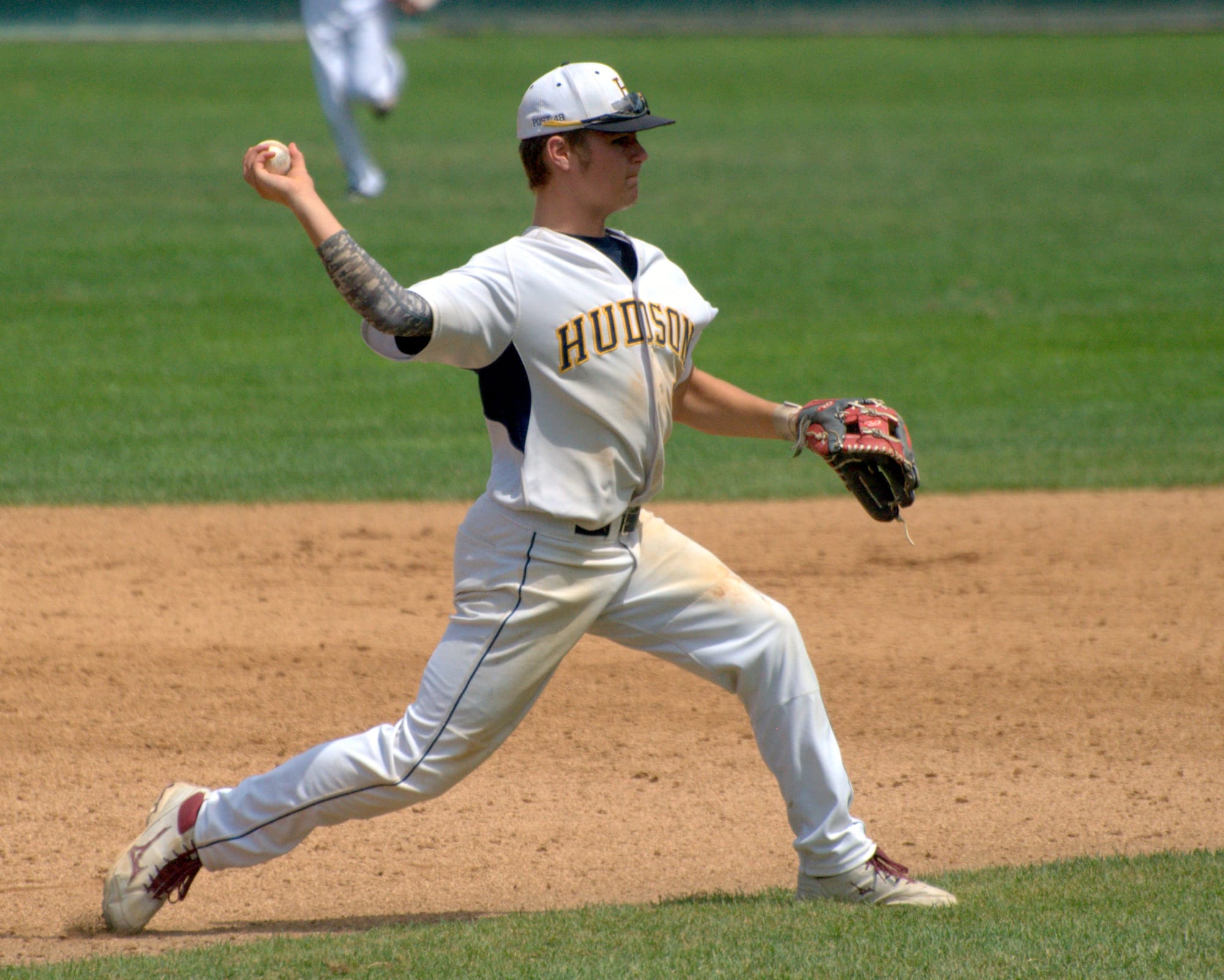 Hudson's Jacen Hudson makes a throw to first.