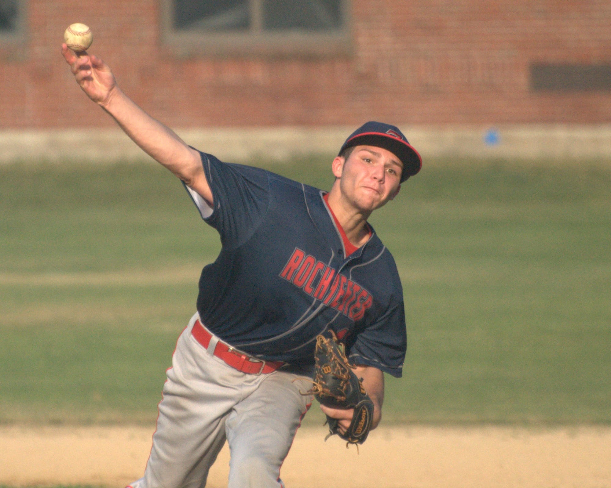 Rochester's Loukas Brigham delivers a pitch.
