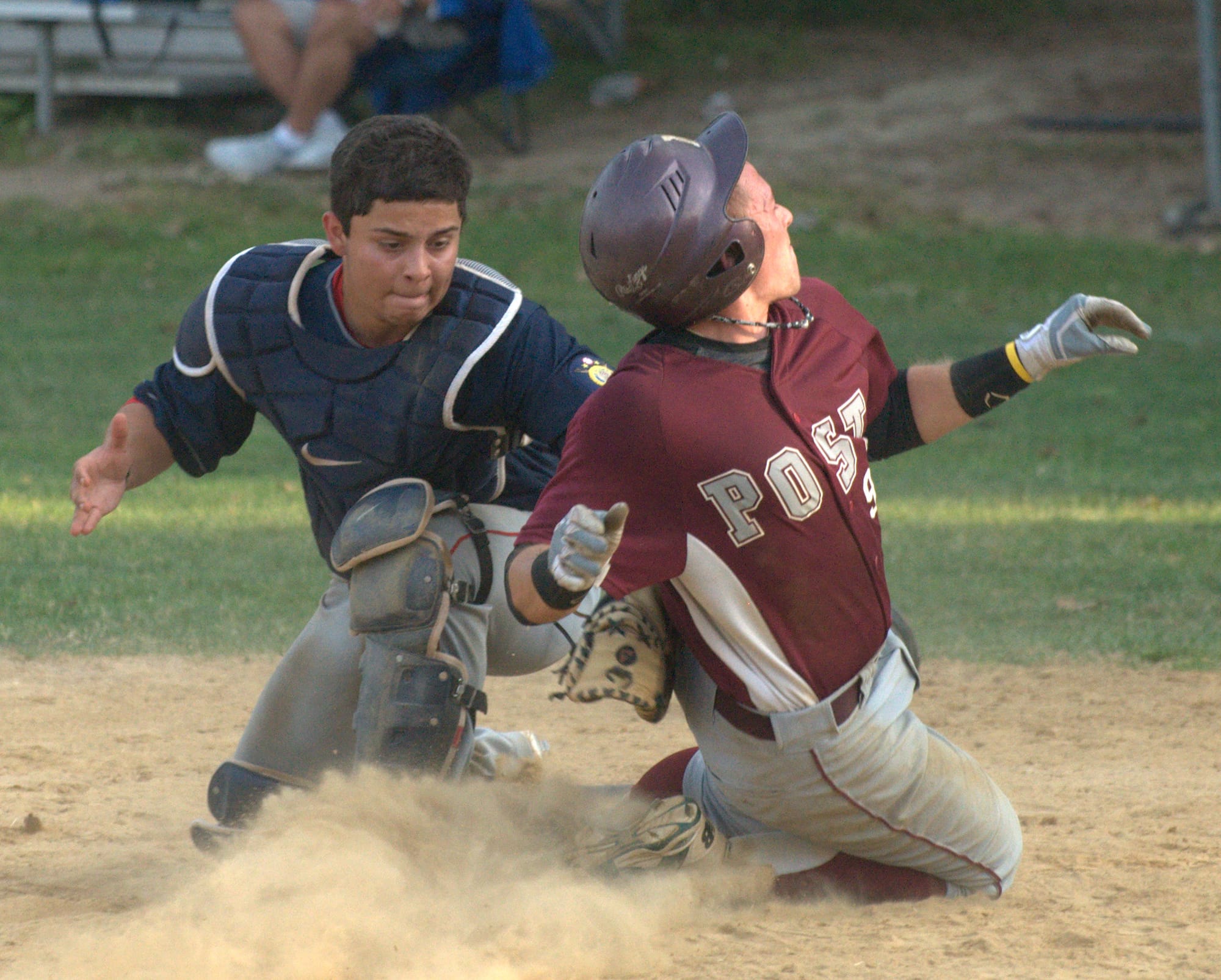 Rochester catcher Logan Larochelle tags out Merrimack's Brendan Holt during Tuesday's game. For more photos, go to the Photo Album.