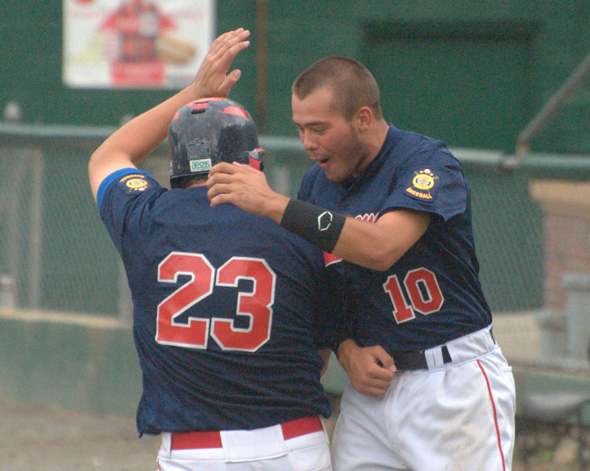 Sweeney's Brendan Sullivan, right, celebrates with Connor Walsh after Walsh scored the game-winning run Sunday against Hudson.