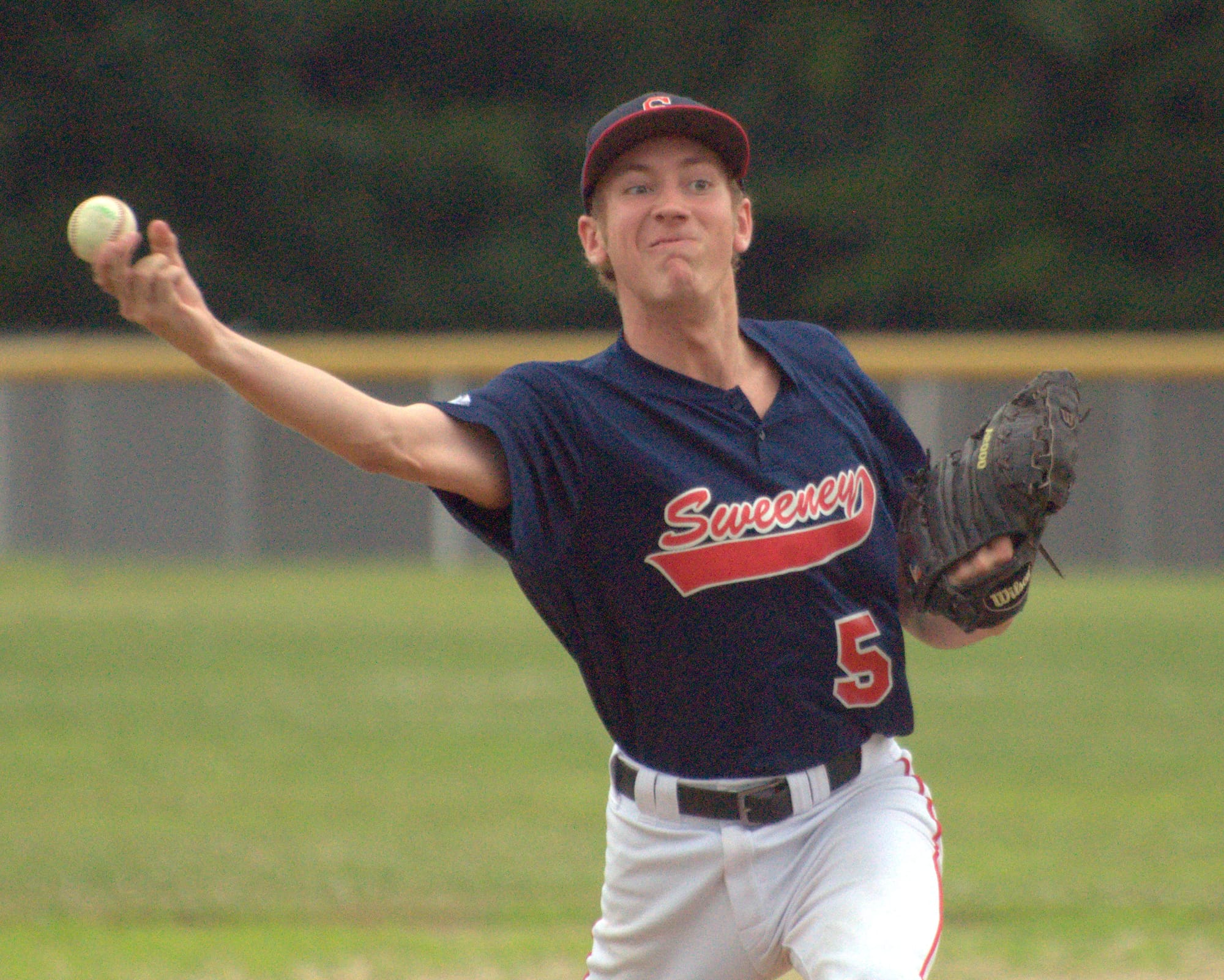 Sweeney's Nolan Flynn pitches during Monday's game.