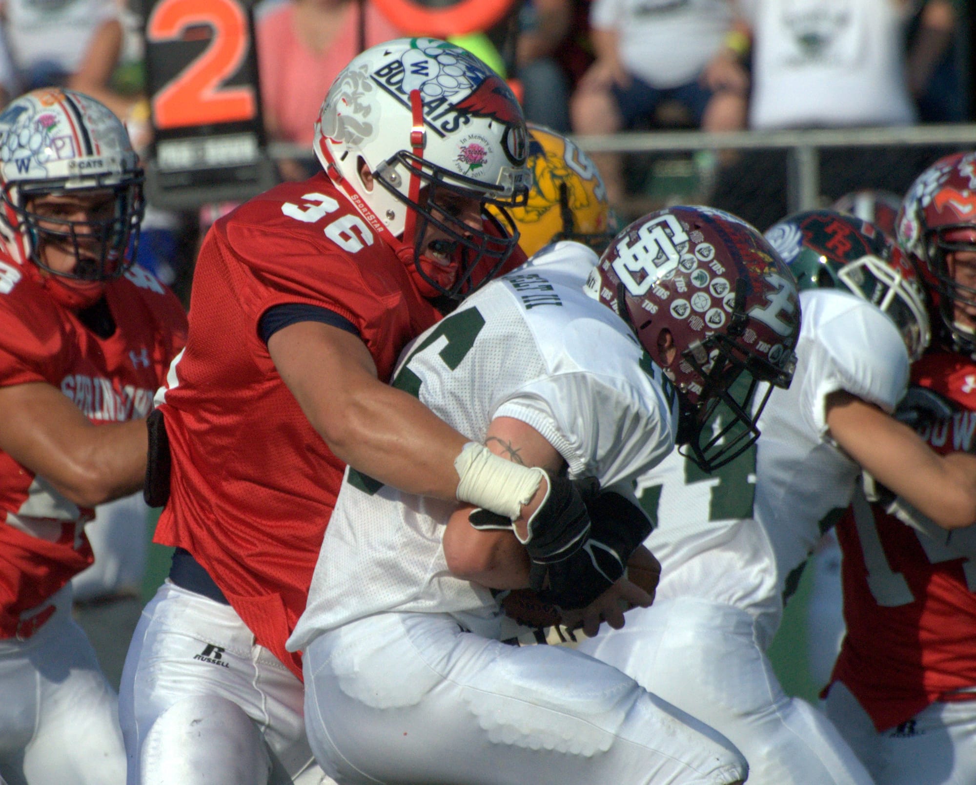 New Hampshire's Jared Kuehl sacks Vermont's James Shufelt III during Saturday's Shrine Maple Sugar Bowl.