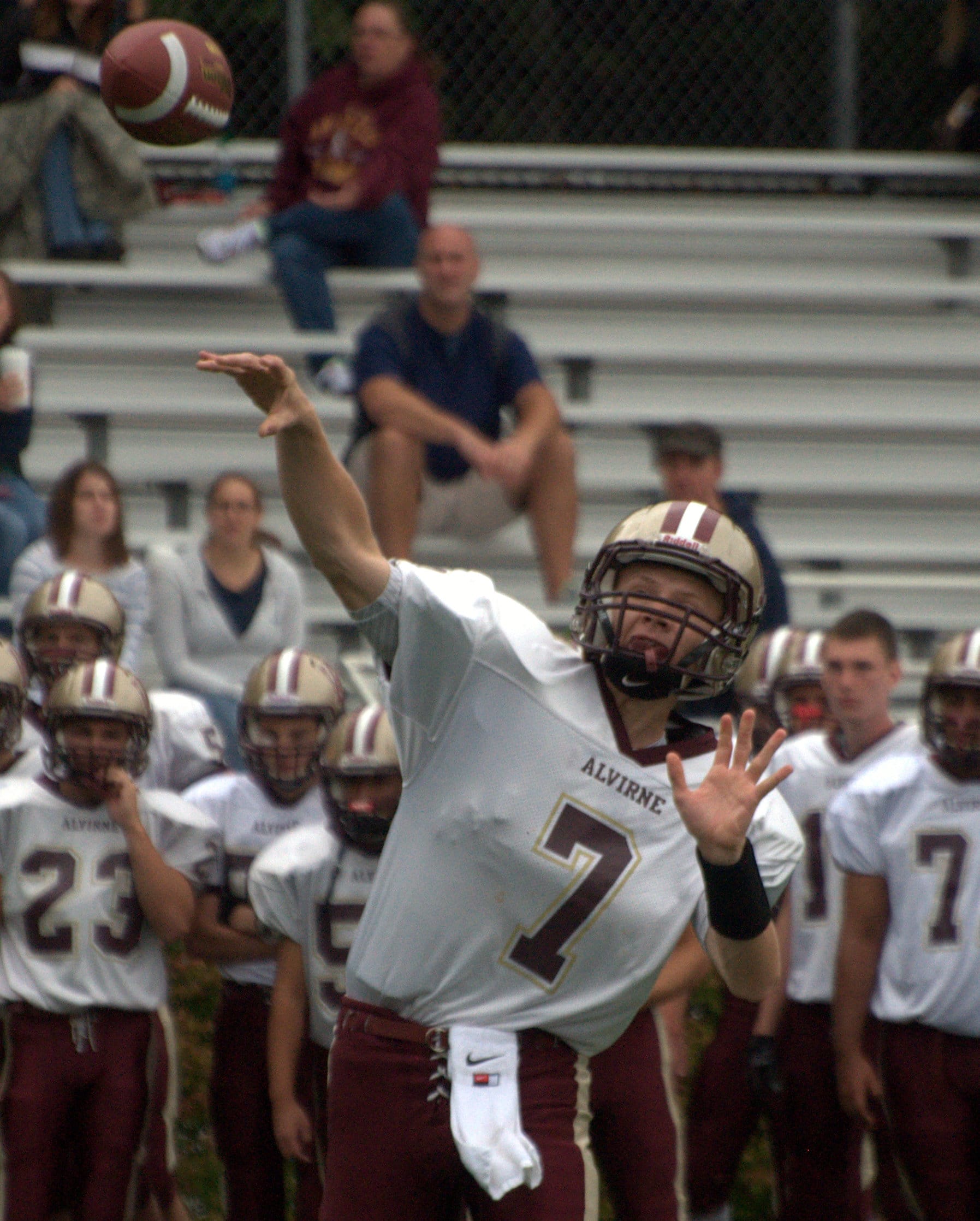 Alvirne's Danny Brown throws a pass.