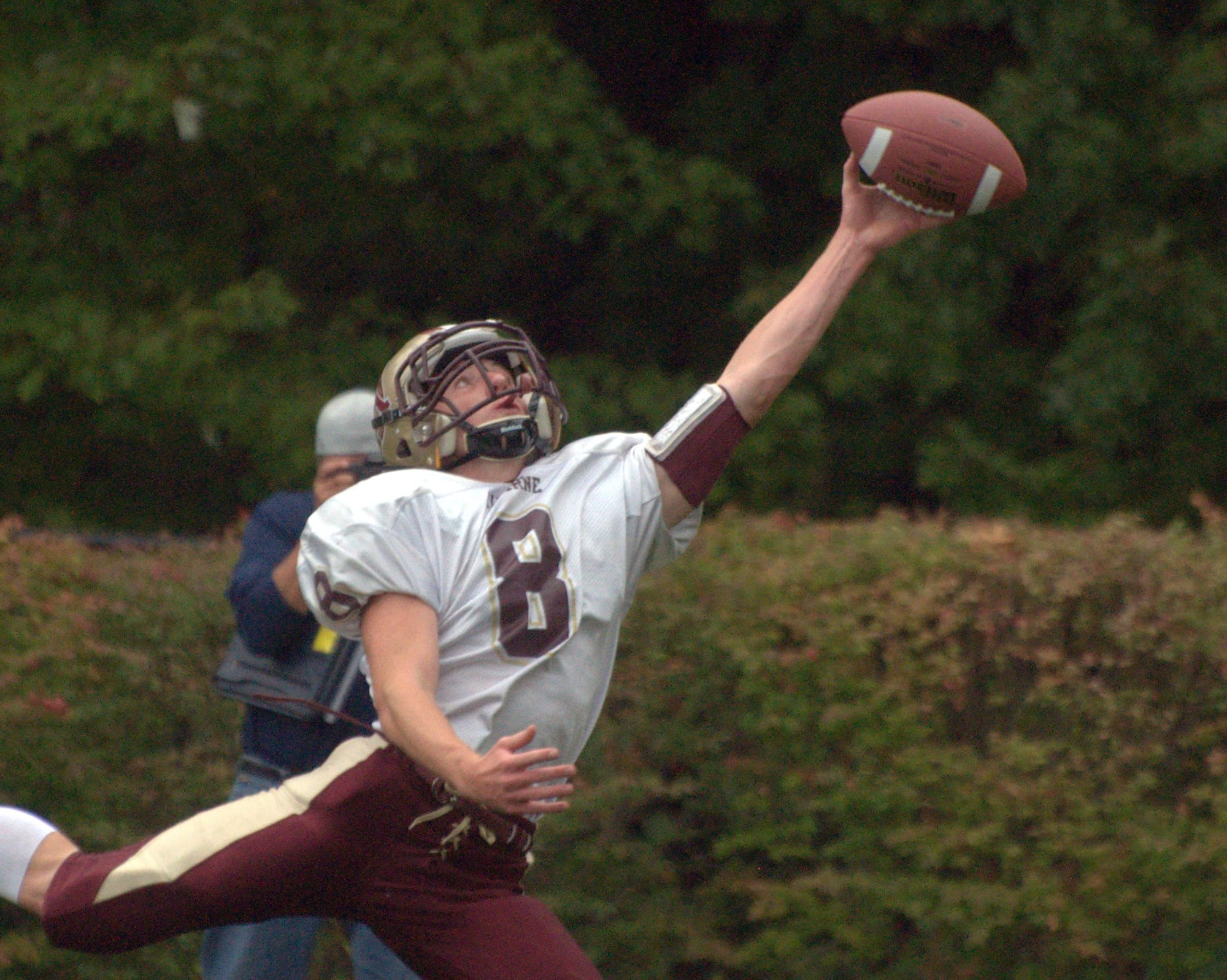 Alvirne's George Notini tries to haul in a pass during Saturday's game.