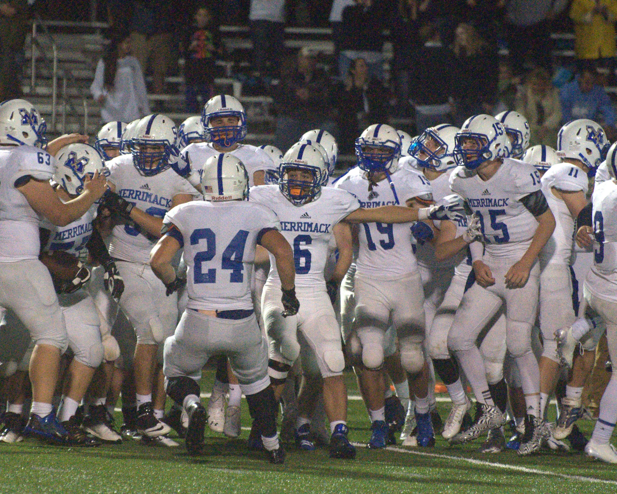 Merrimack players celebrate after beating Bishop Guertin Saturday for the first time in 14 years.