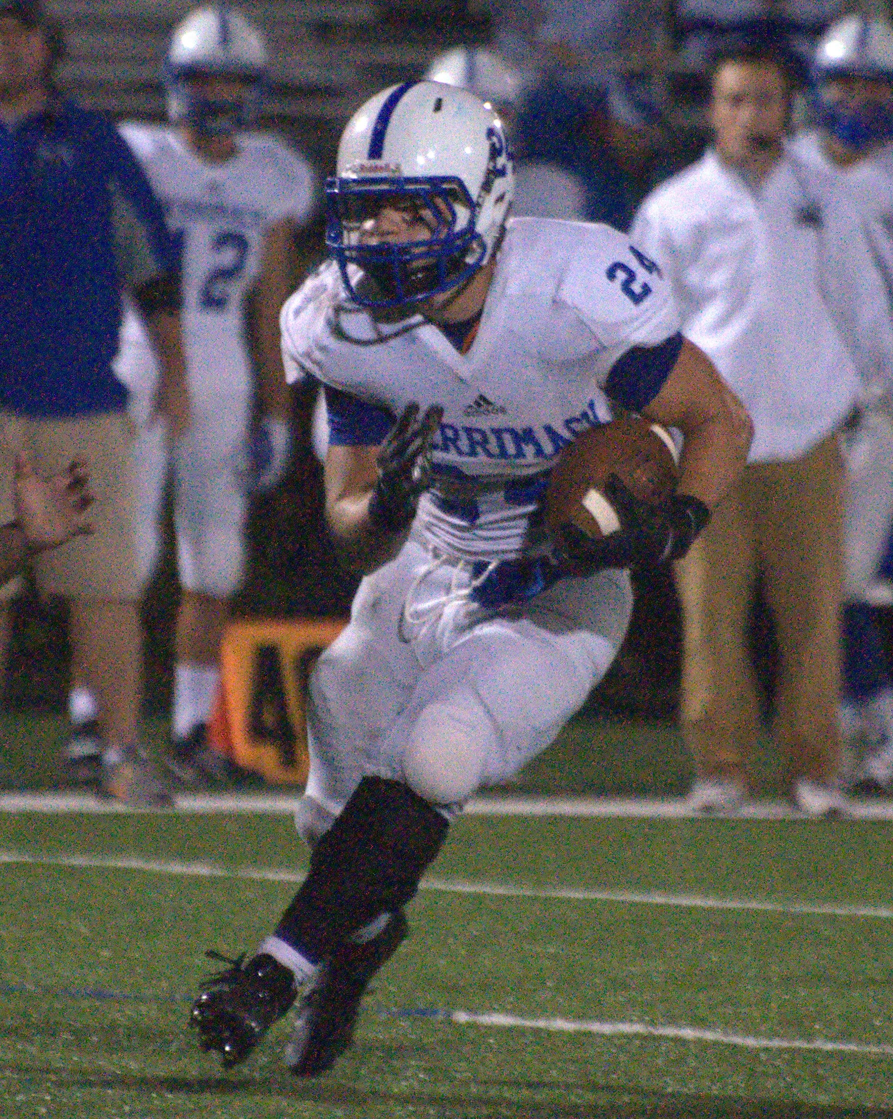 Merrimack's Joe Giampietro carries the ball during Saturday's game.