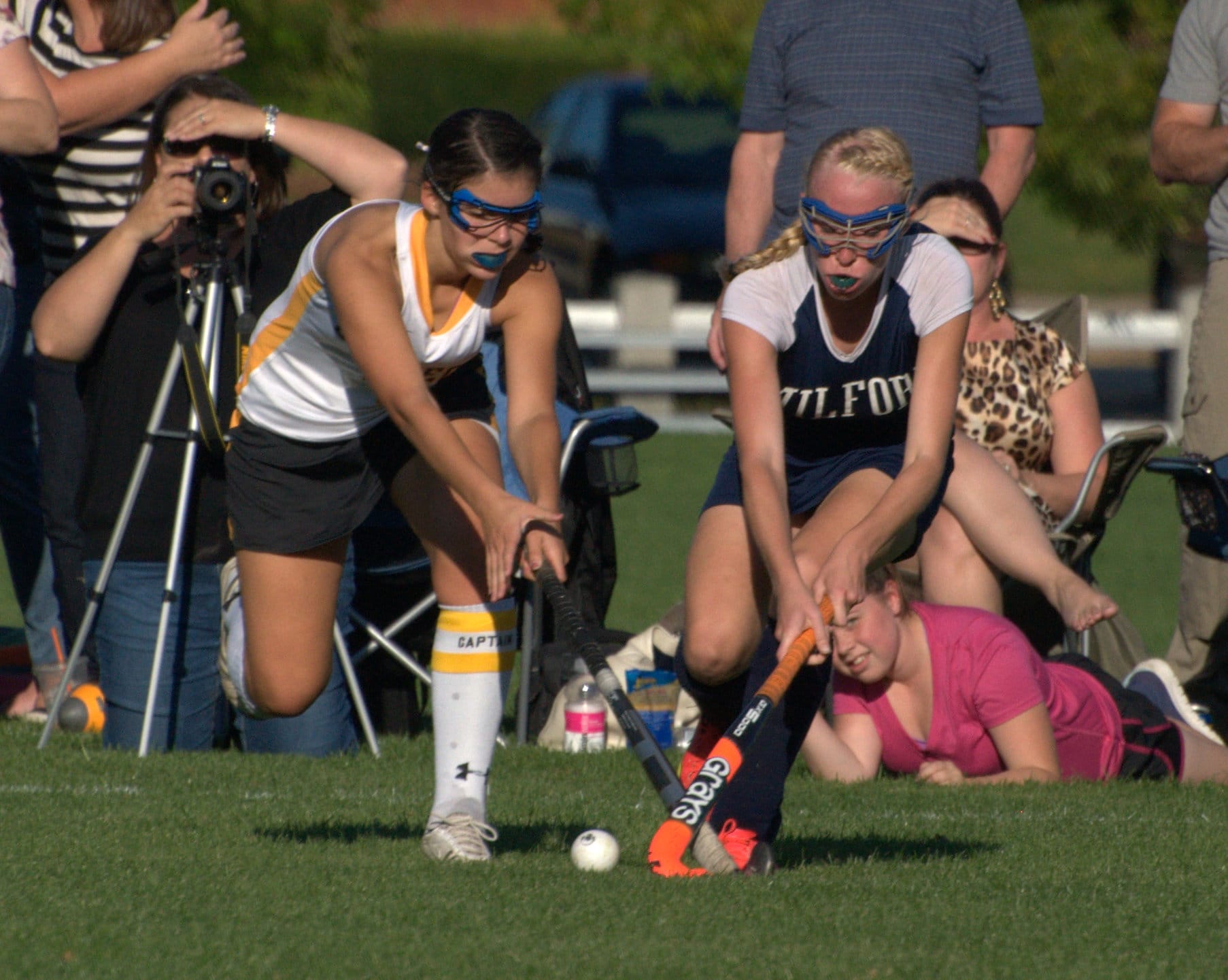 Souhegan's Katie Almeida and Milford's Kelsey Poulter fight for the ball during Friday's game.