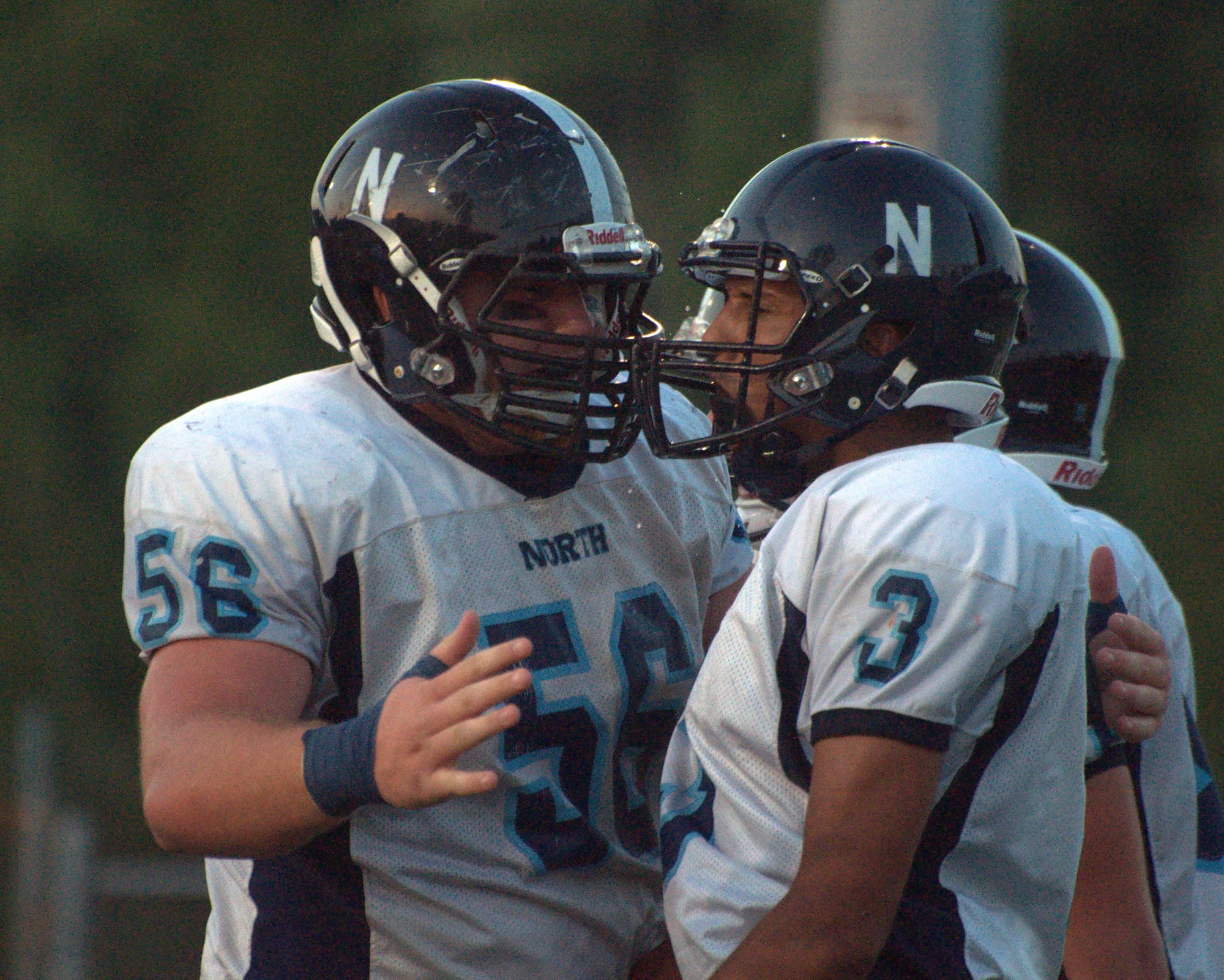 Nashua North's Matt LaVallee, left, celebrates with Miles Cassin-Reed after a touchdown Friday against Timberlane.