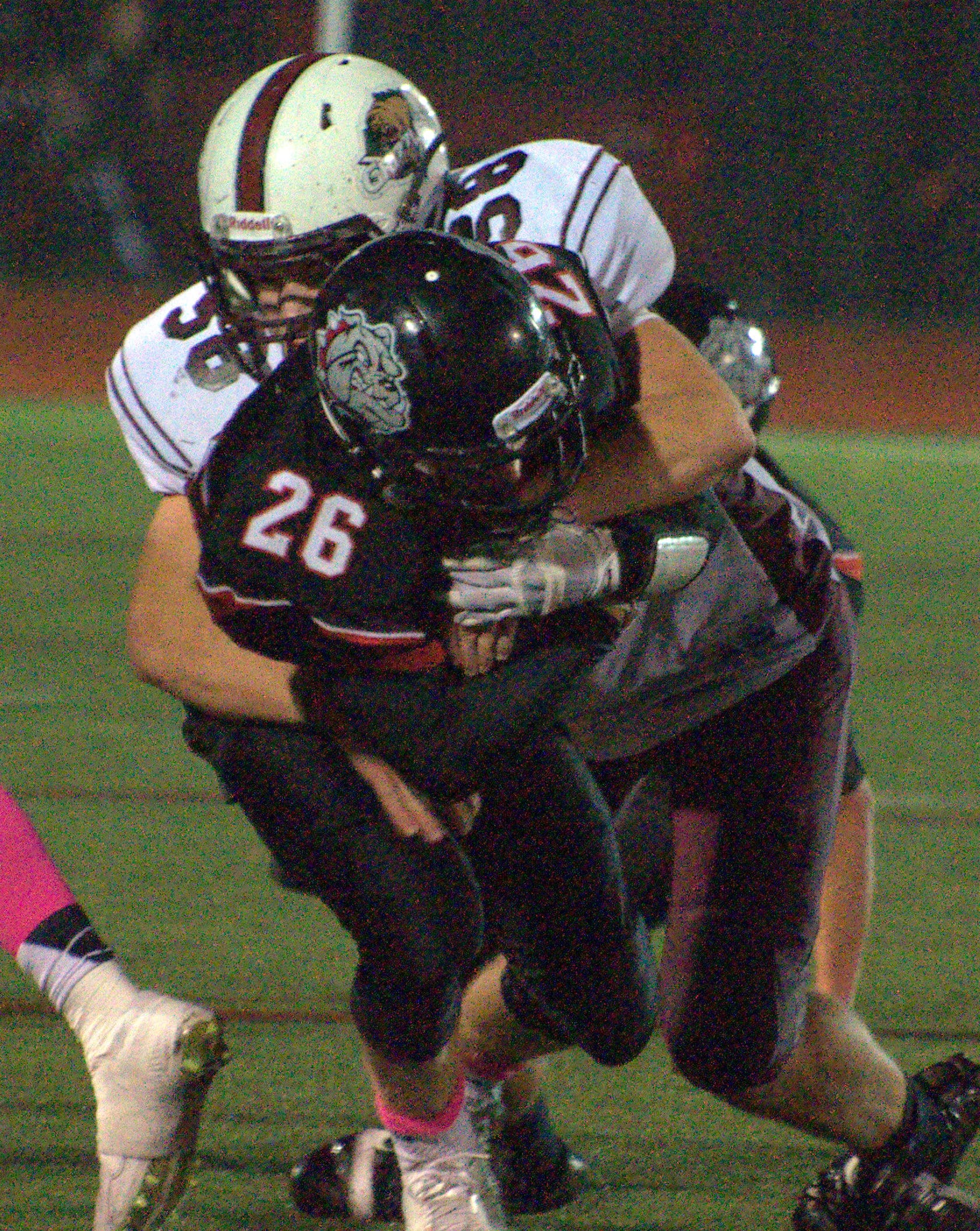 Goffstown's Andrew Guillemette brings down Bedford's Colin Cashin.