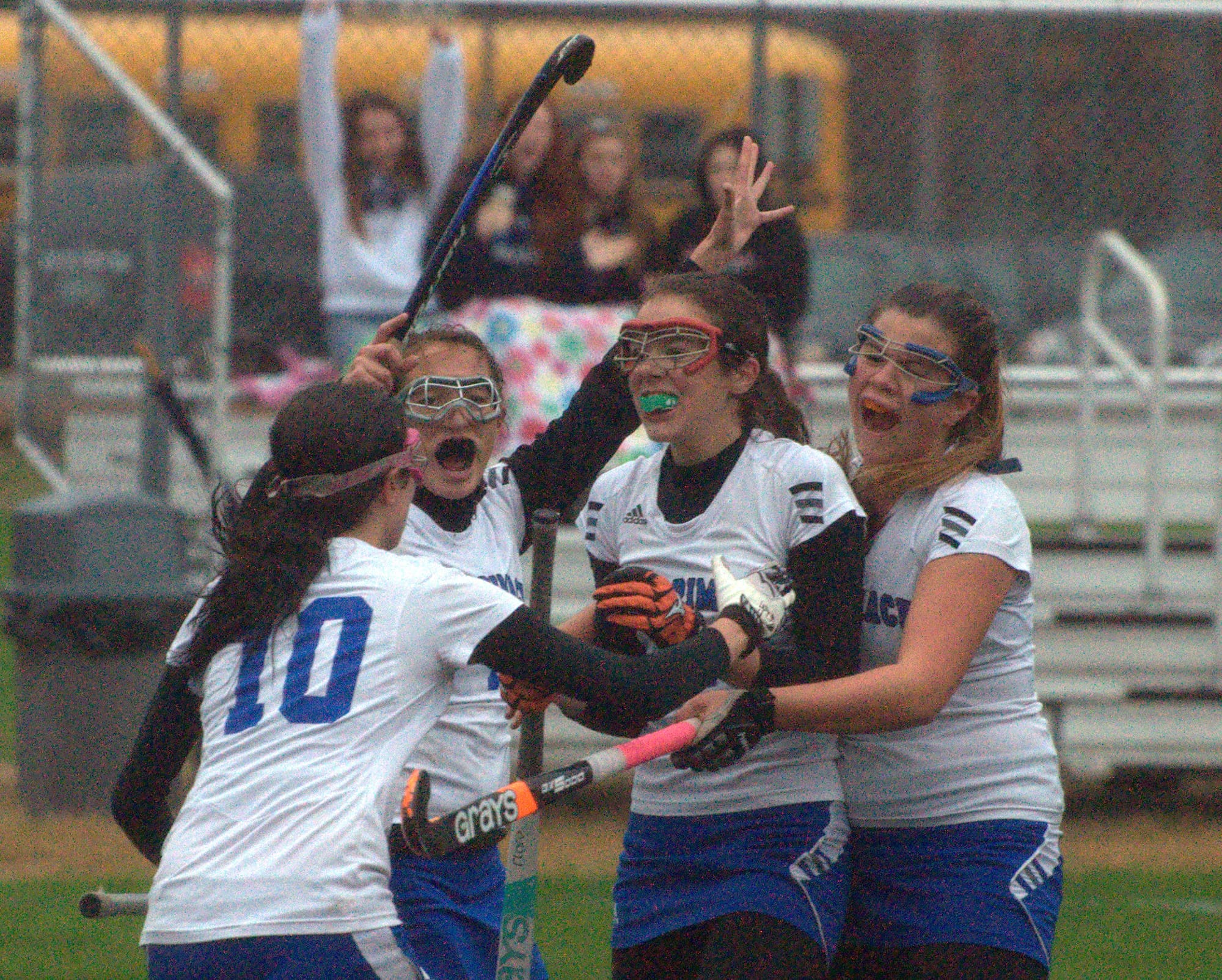Merrimack players celebrate a goal during Wednesday's preliminary round game against Salem.