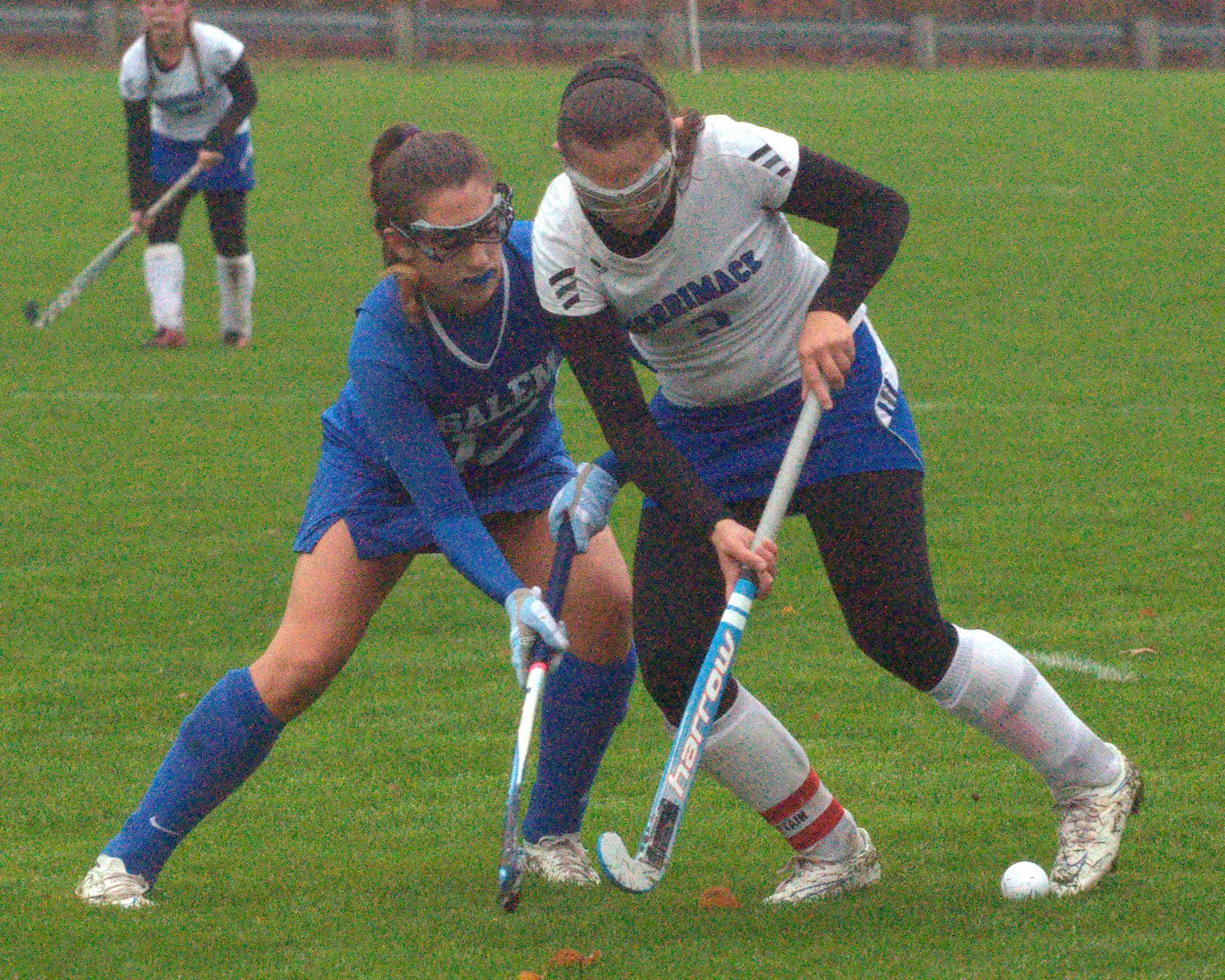 Salem's Allie Sirmain and Merrimack's Rachel Schwartz battle for the ball.