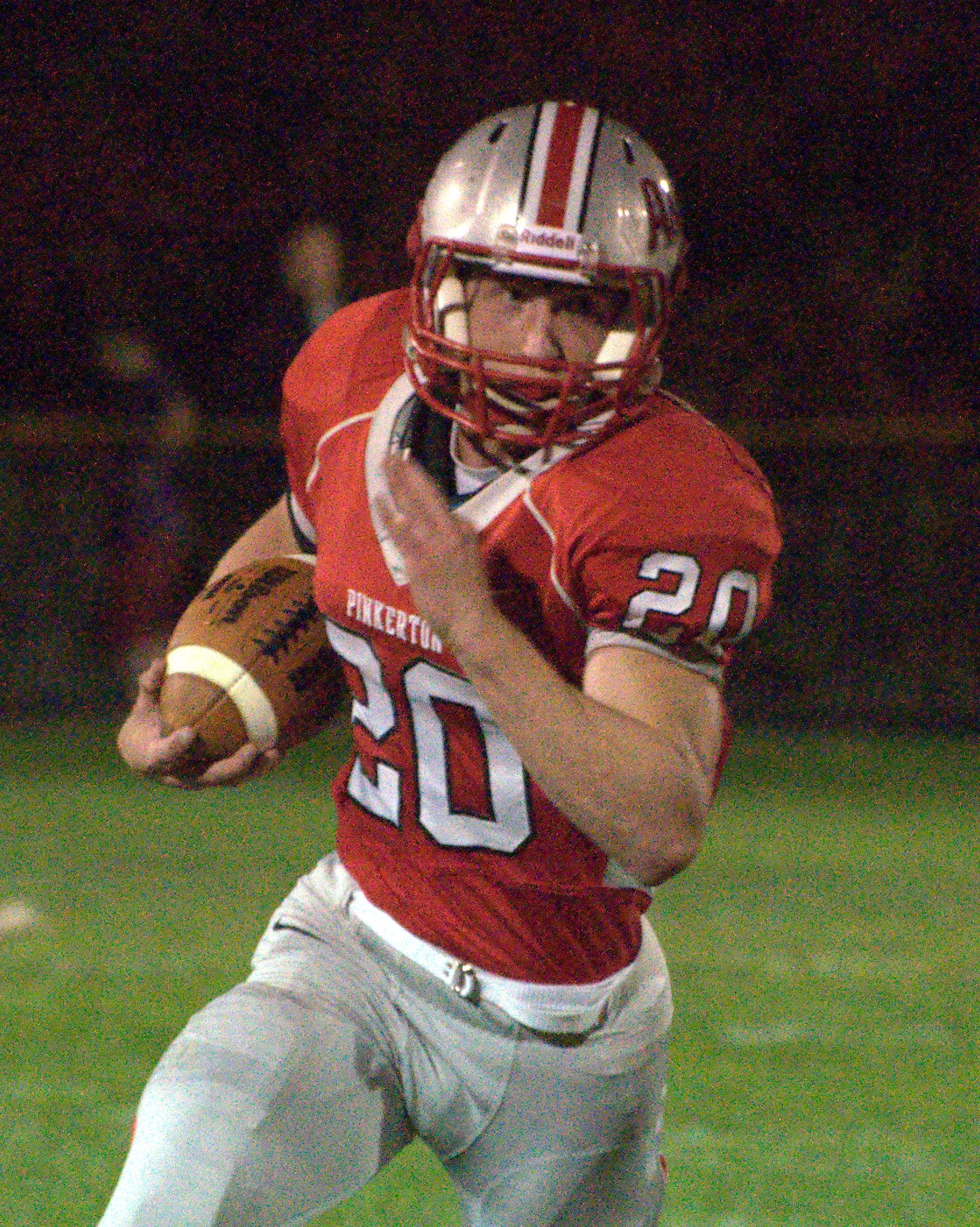 Pinkerton's TJ Urbanik runs with the ball.