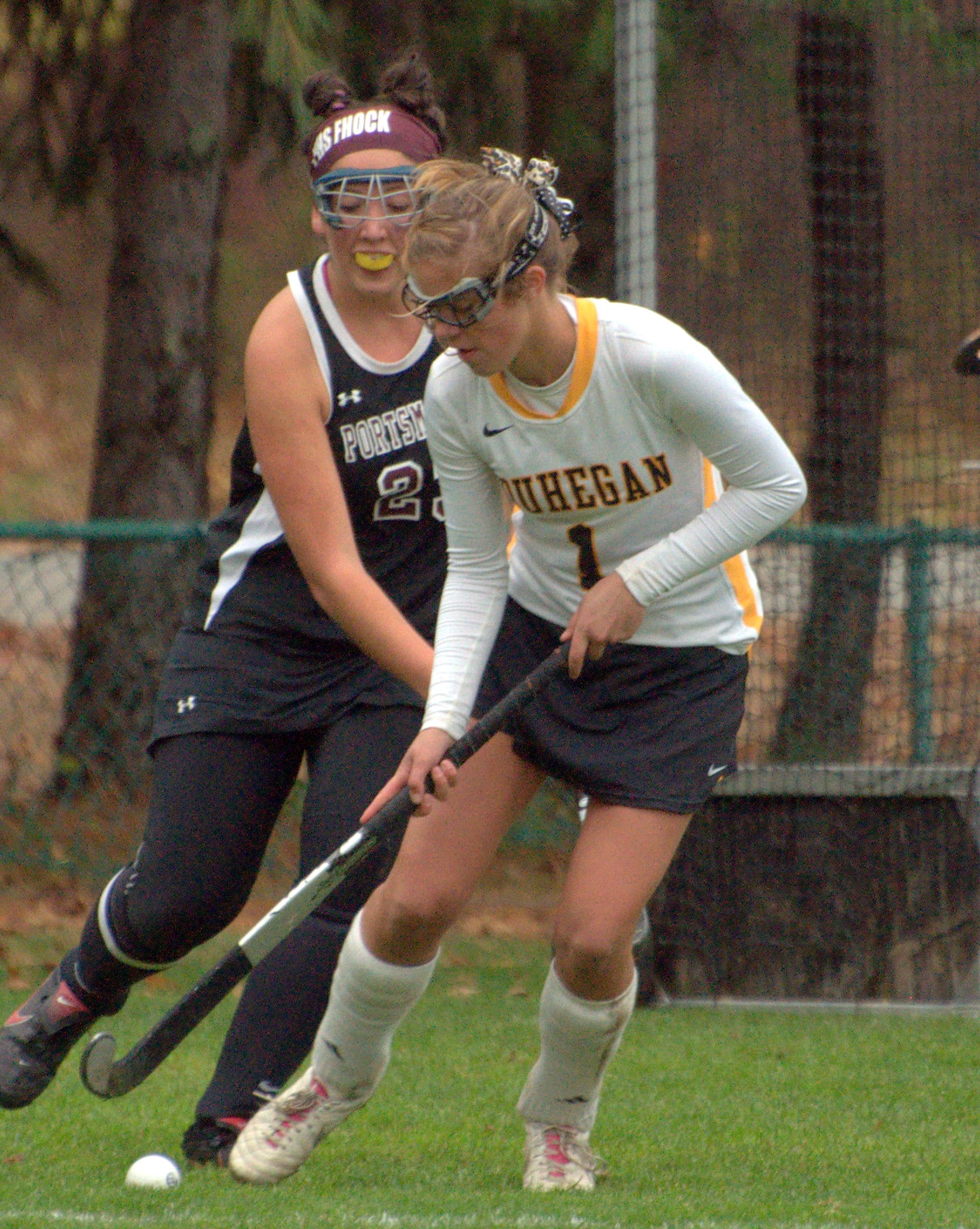 Souhegan's Lauren McCormick moves the ball around the circle.
