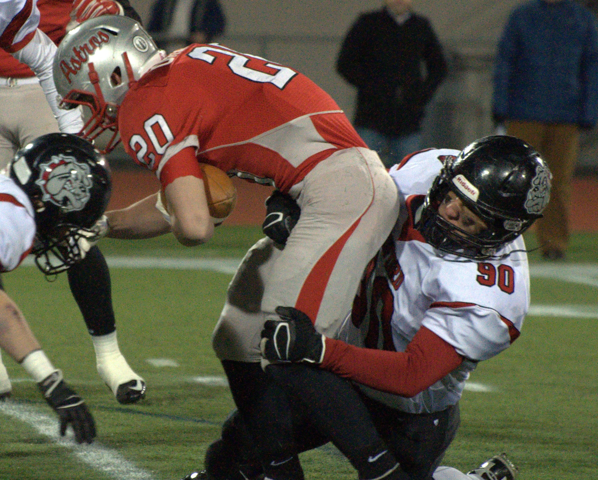 Bedford's Eric Glassman brings down Pinkerton's T.J. Urbanik.