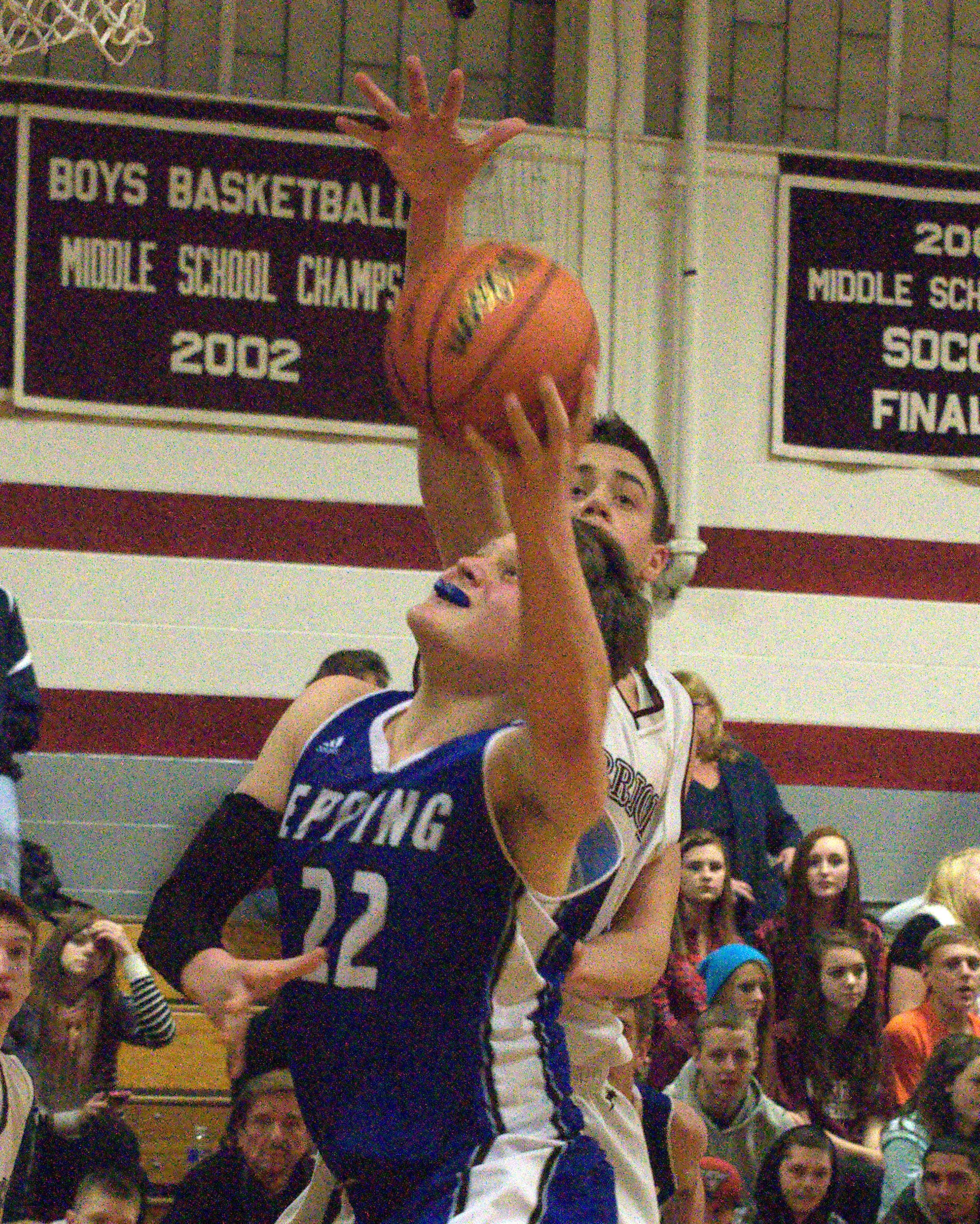 Epping's Brett Couture goes in for a layup as Wilton-Lyndeborough's Trey Carrier defends during Friday's game.