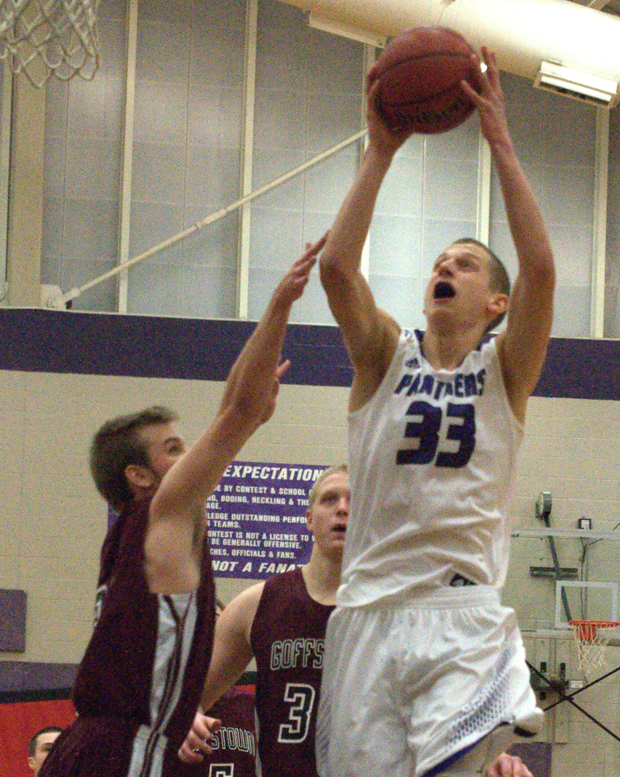 Nashua South's Mike Osgood goes up for a shot.