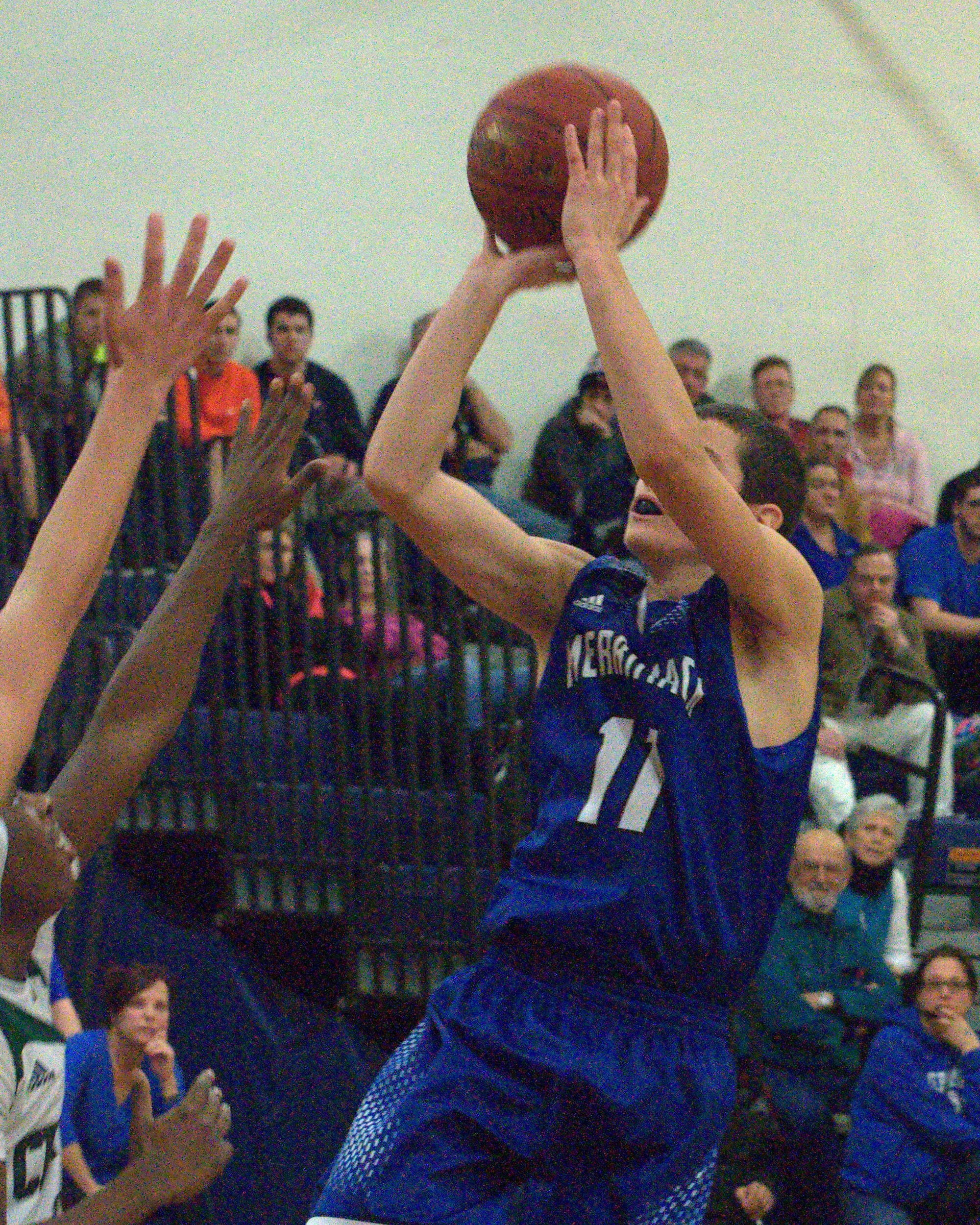 Merrimack's Andrew Wojciak pulls up for a jump shot.