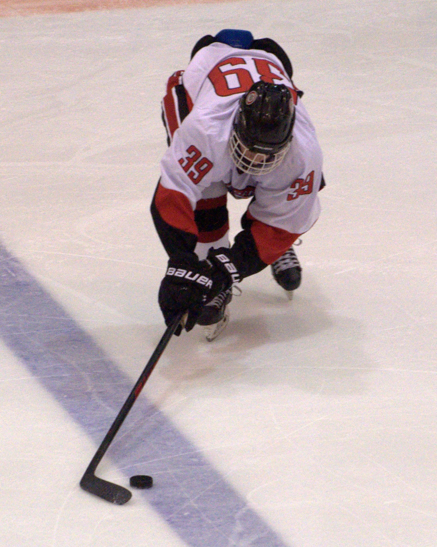 Bedford's Matthew Giroux tries to keep the puck in the zone.
