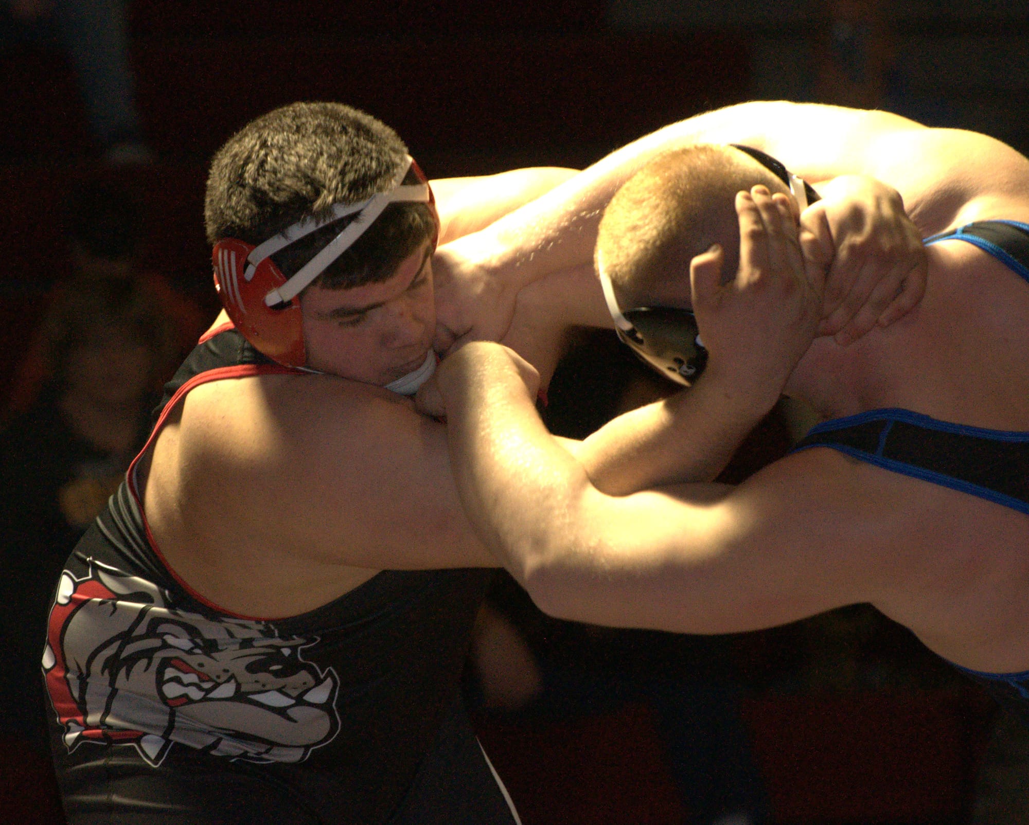 Bedford's Bobby Heald wrestles Salem's Michael Poulin during Wednesday's dual meet.