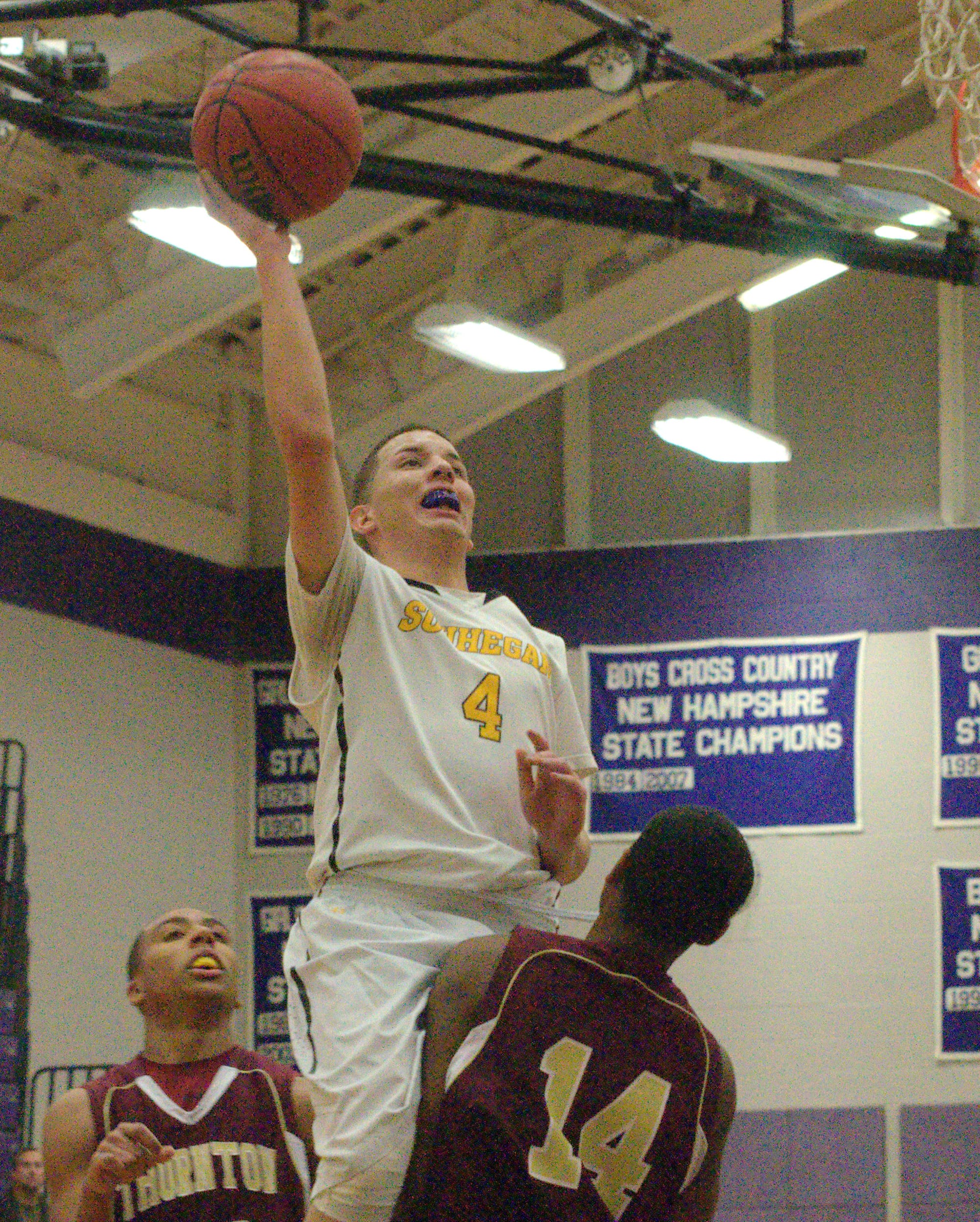 Souhegan's Alex Hill goes in for a layup.