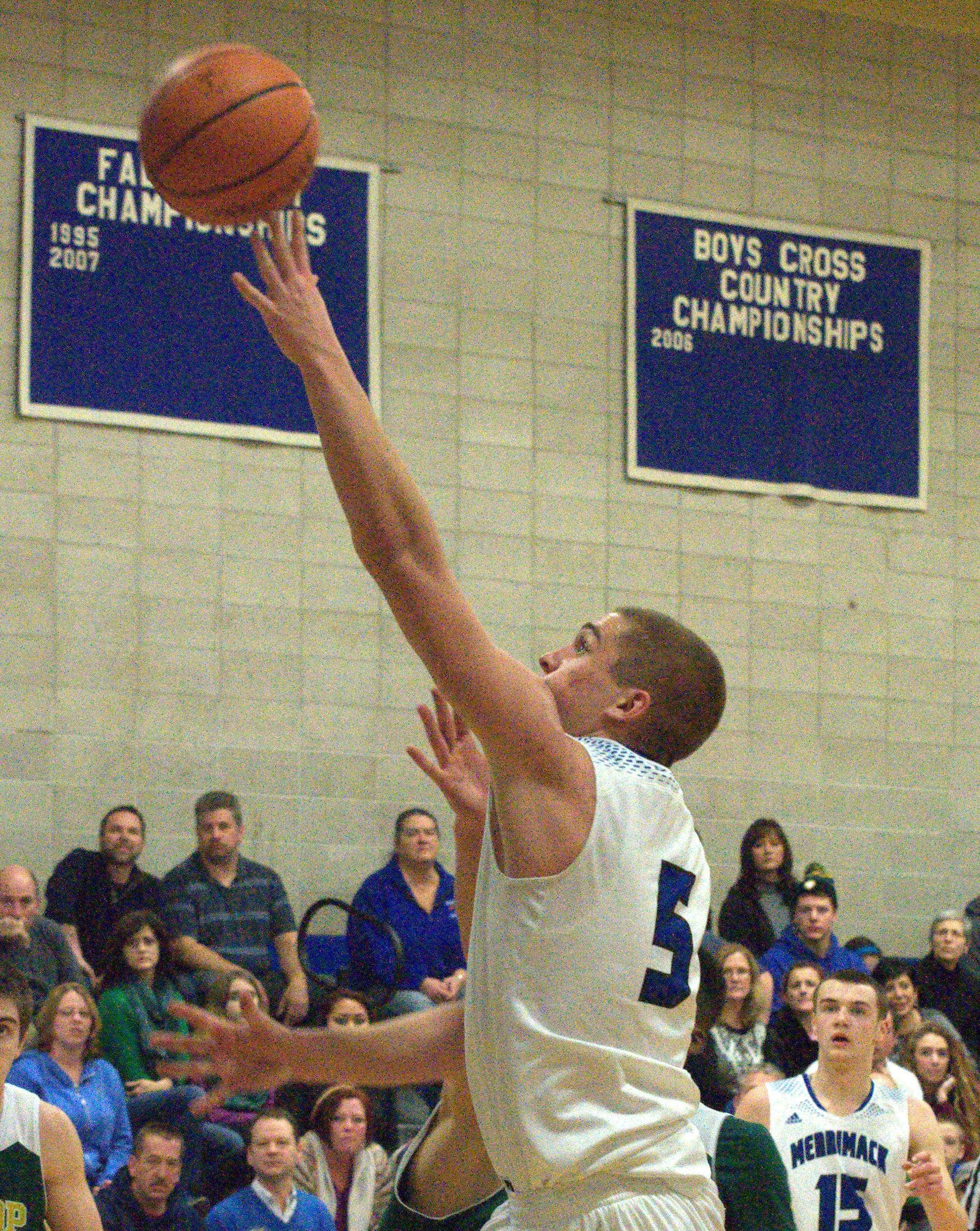 Merrimack's Ian Roberts puts up a shot.