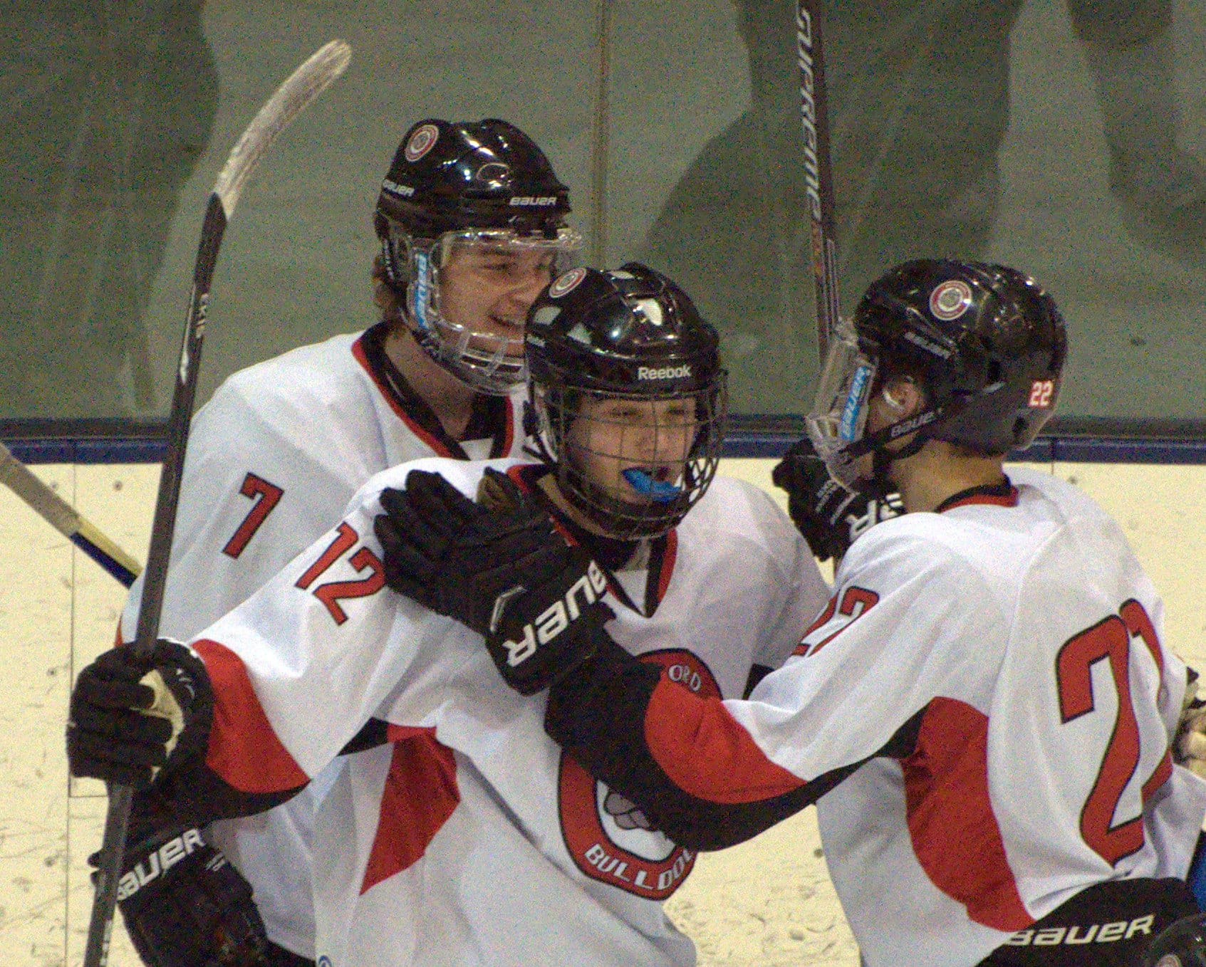 Bedford players celebrate after a goal by Griffin Gagne, middle, against Manchester Central.