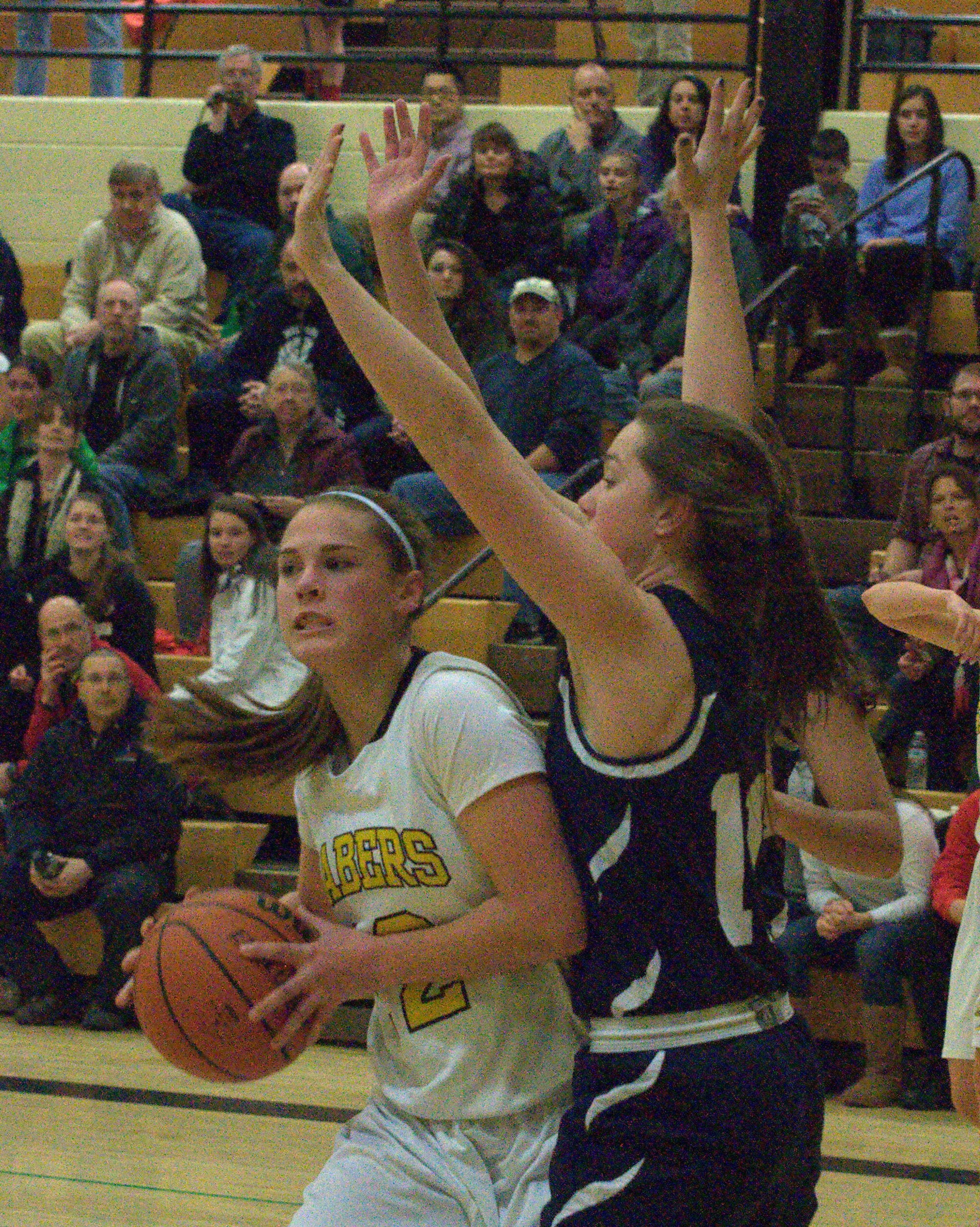 Souhegan's Hannah Chick tries to make a move against Milford's Kaitlyn Matthews.