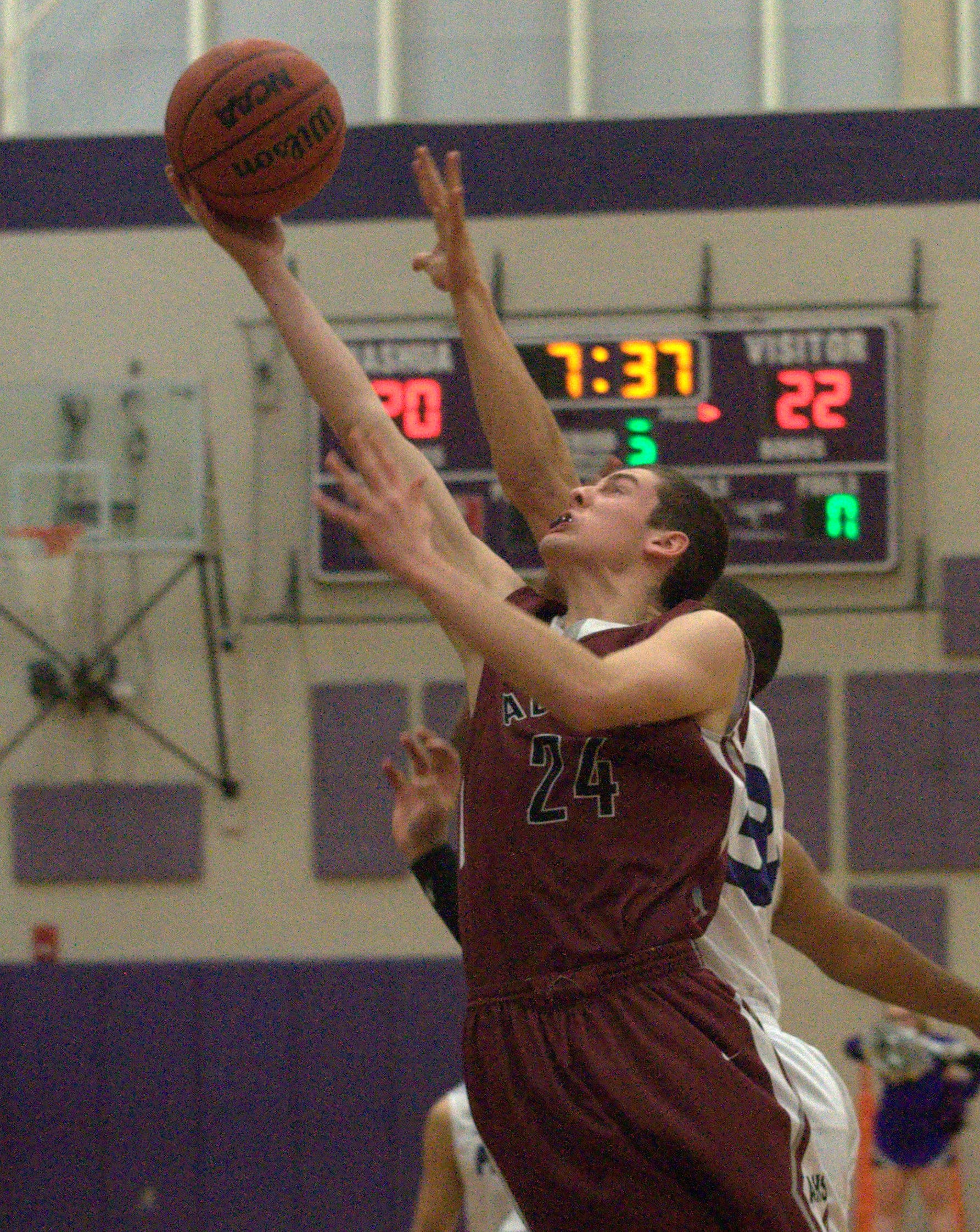 Alvirne's Andrew Wetmore drives to the basket.