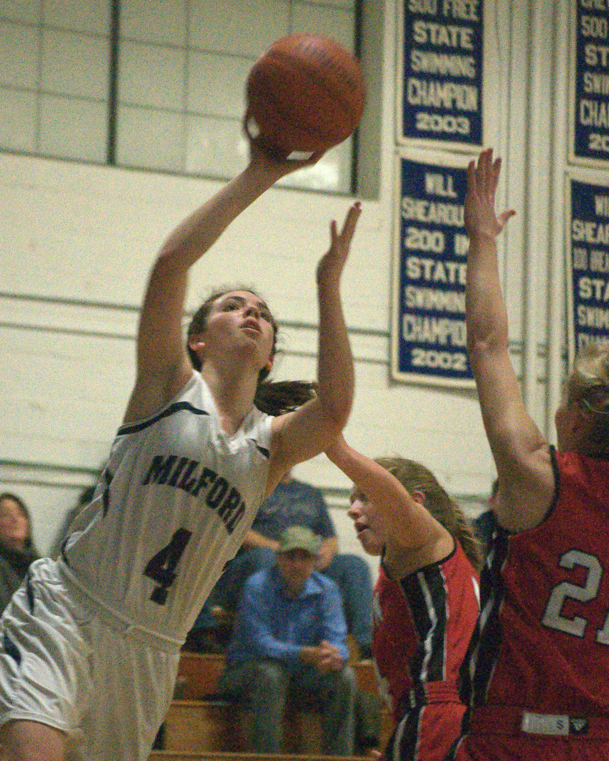 Milford's Adelle Pitsas puts up a shot.