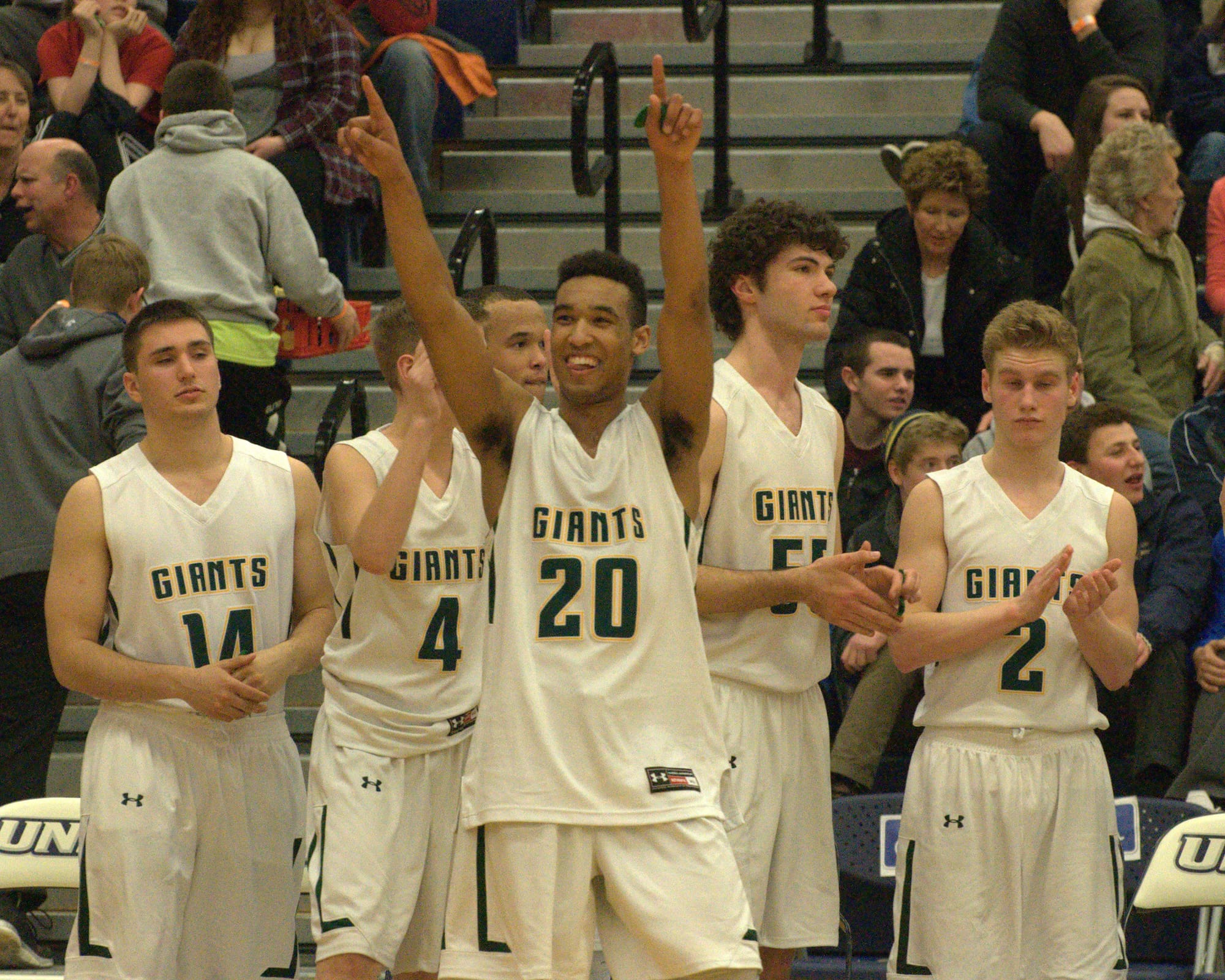 Bishop Brady's Joe Bell points to the crowd after the Giants defeated Goffstown in the Division II semifinal on Wednesday.