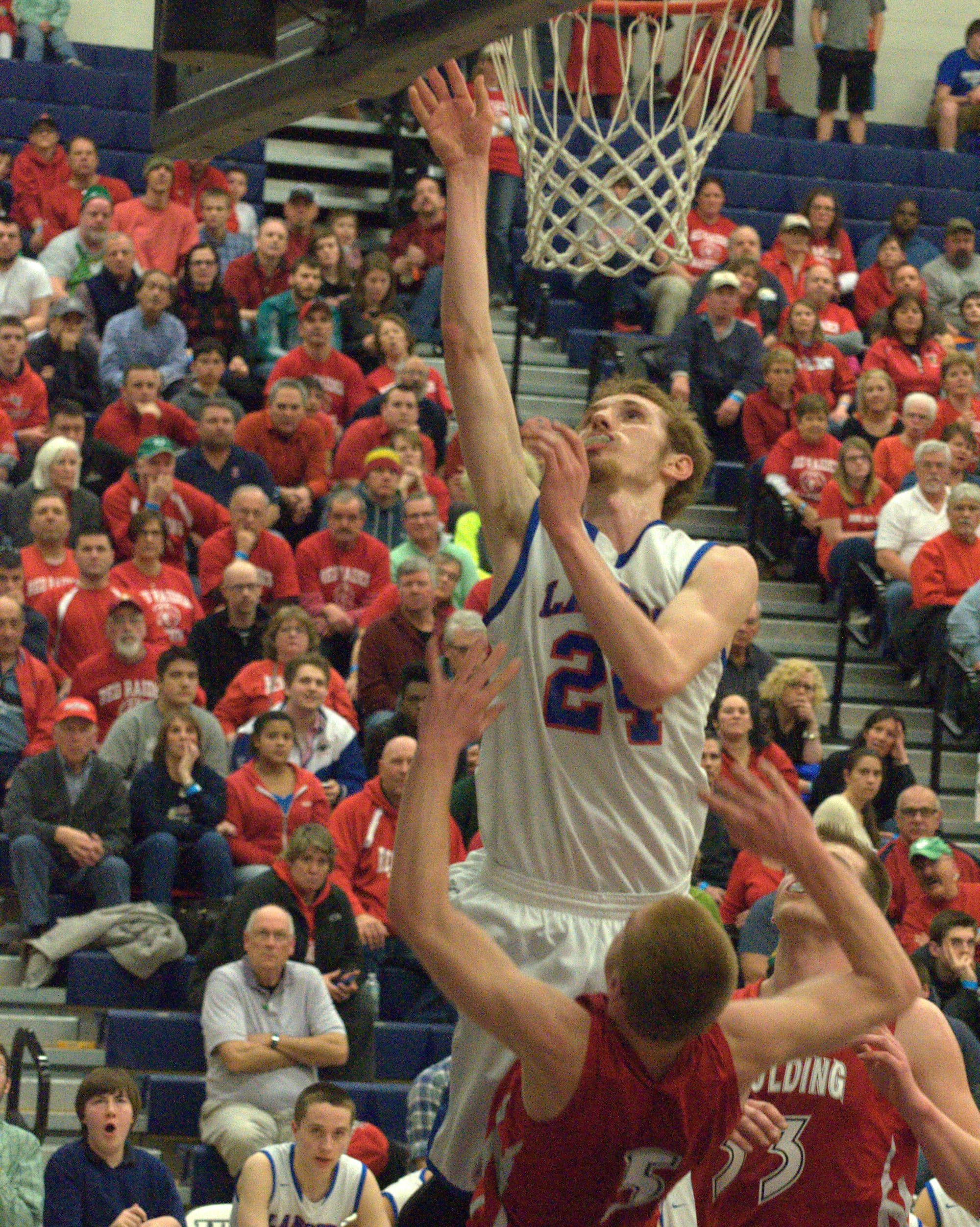 Londonderry's Joseph Kwiatkowski goes in for a layup.