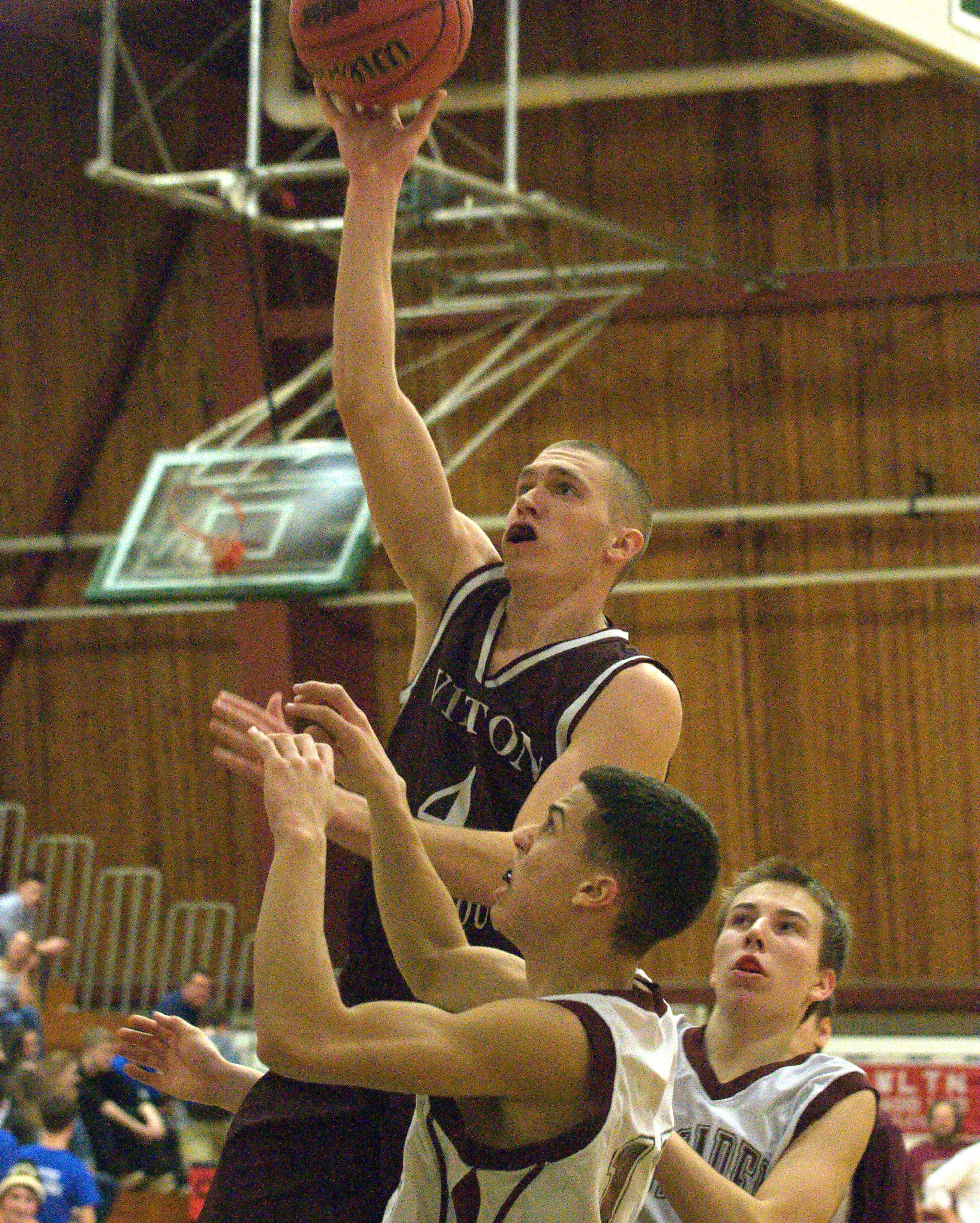 Wilton-Lyndeborough's Jordan Litts puts up a shot during Monday's semifinal win over Littleton. For more photos, go to the Photo Album.