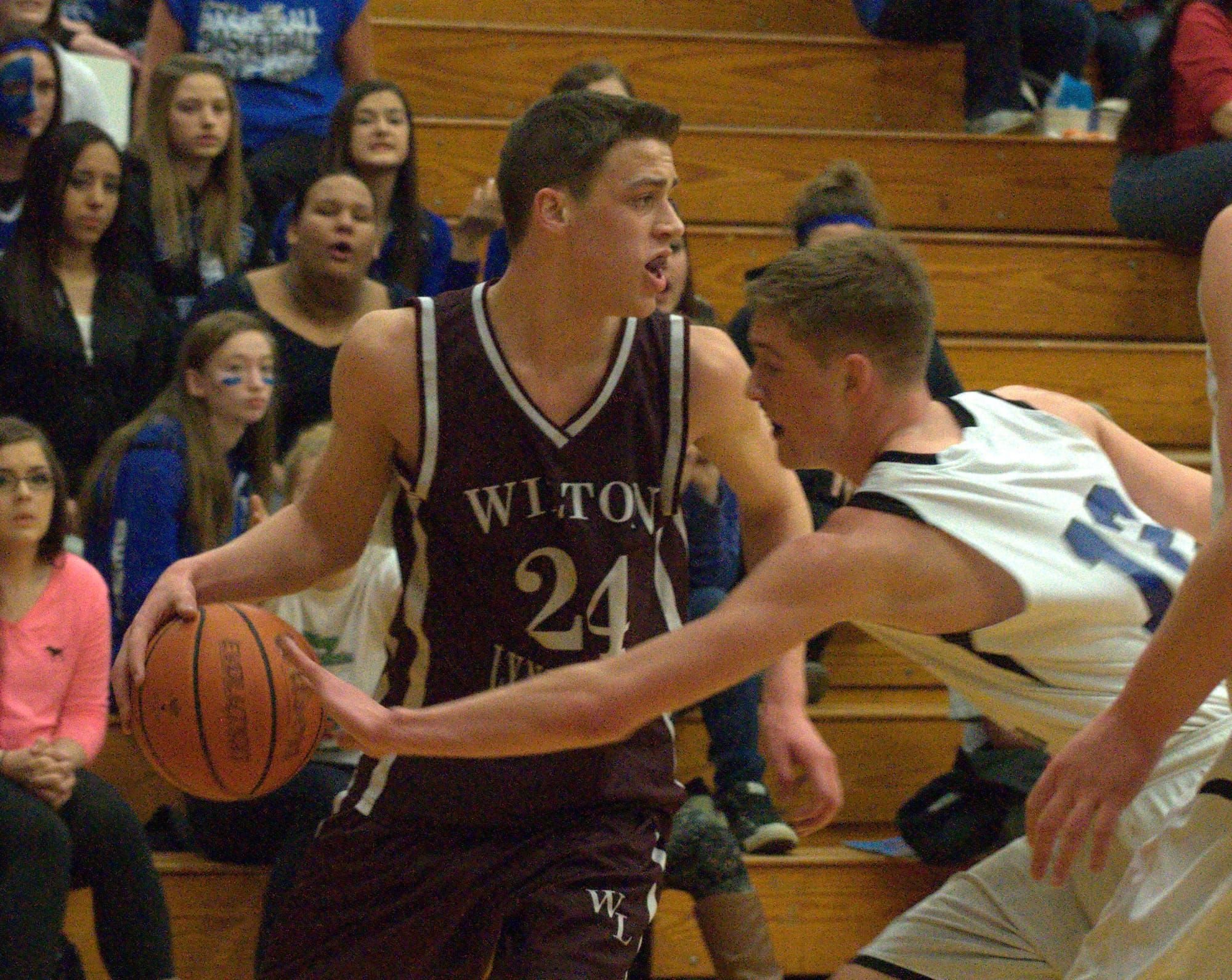 Epping's Jackson Rivers tries to knock the ball away from Wilton-Lyndeborough's Trey Carrier.