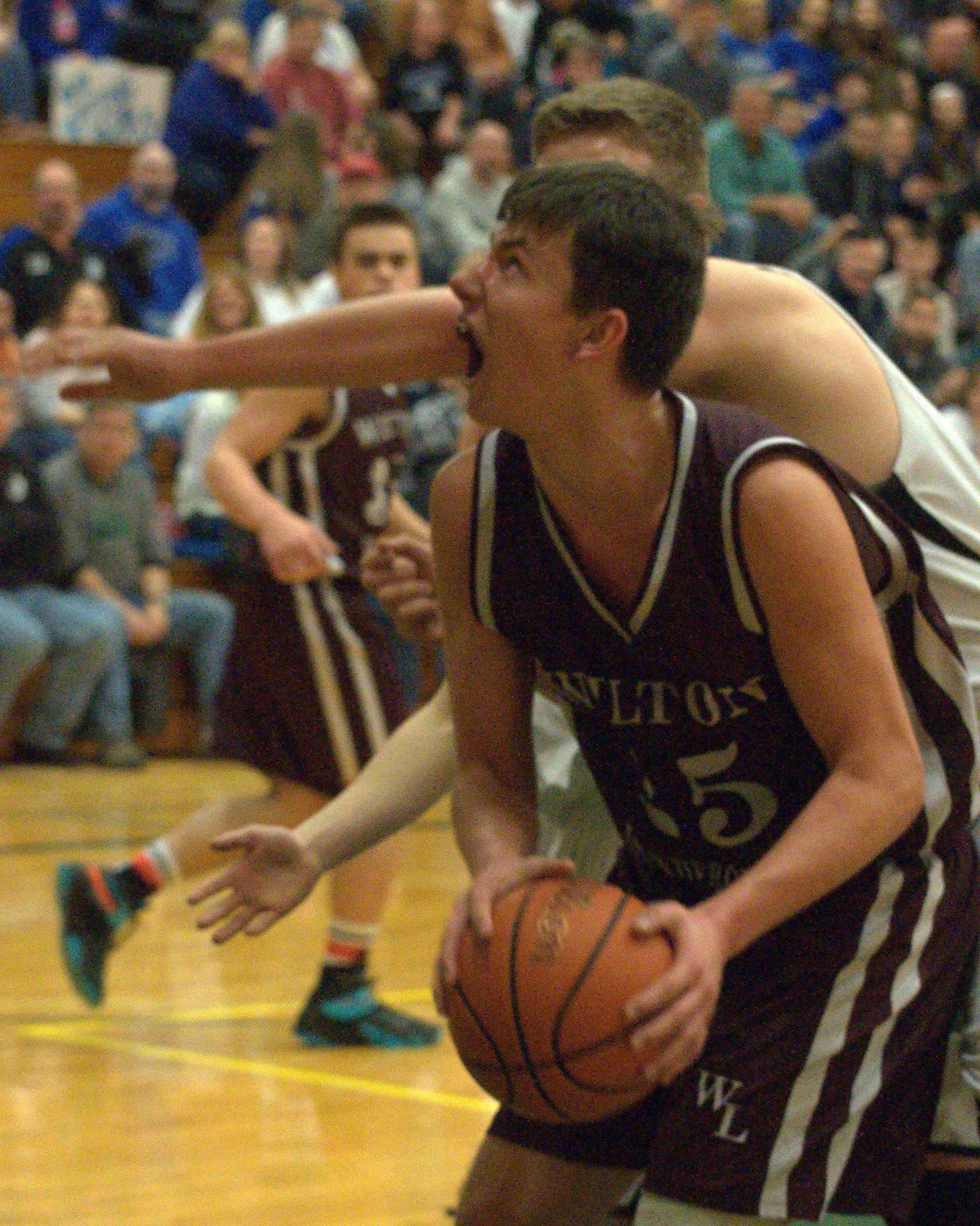 Wilton-Lyndeborough's Duncan Rae tries to make a move to the basket.