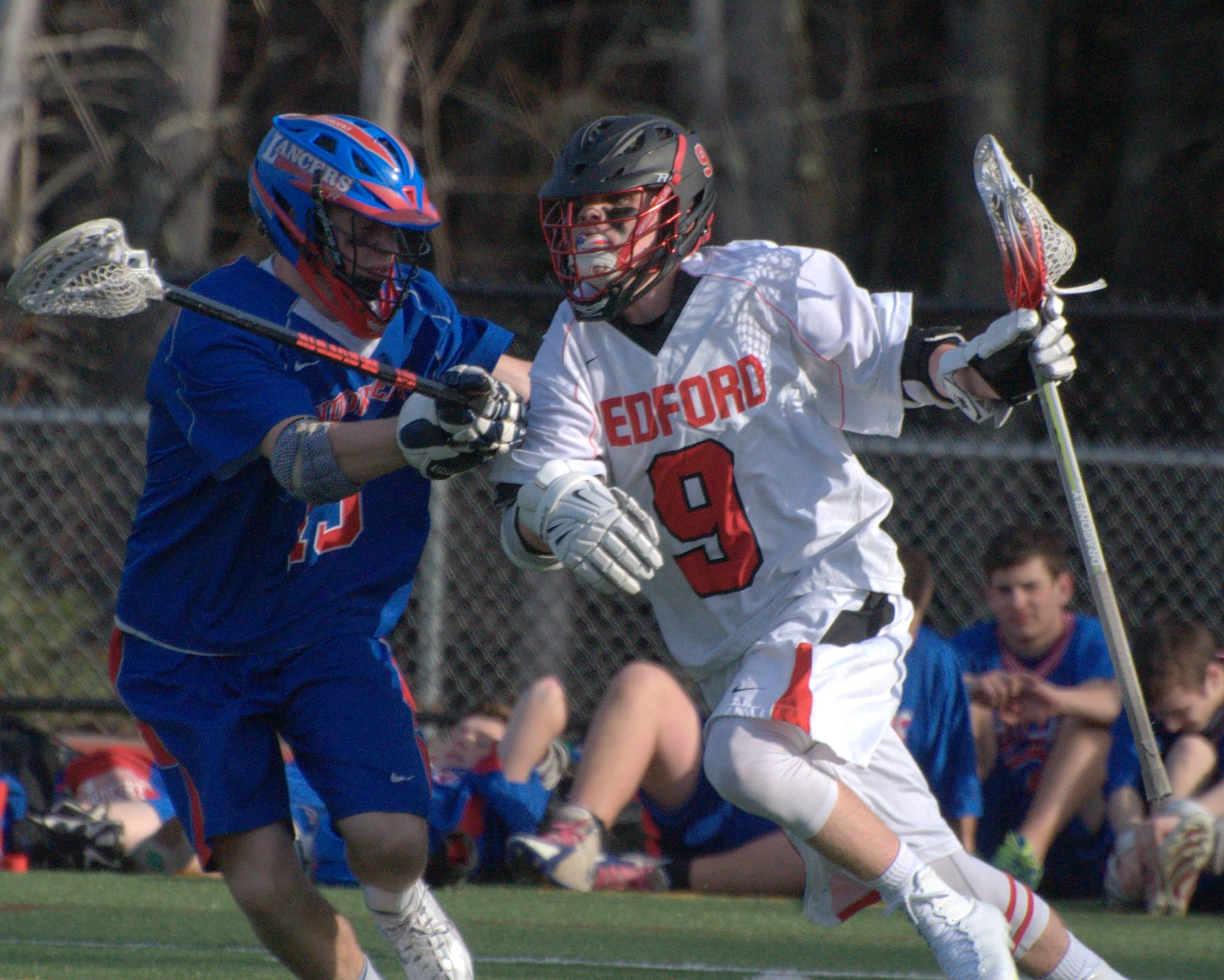 Bedford's Dakota Clark tries to get by Londonderry's Bobby McEachern during Monday's game.