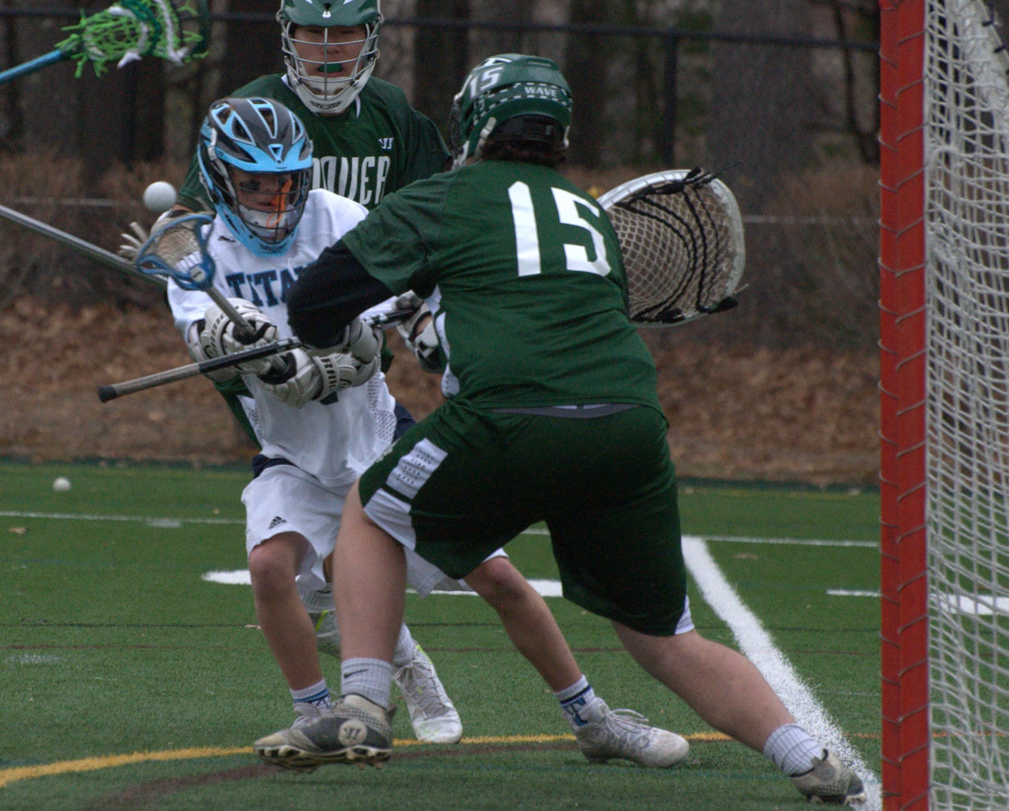 Nashua North's Todd Redman puts a shot past Dover's Chris Beardsworth during Wednesday's game.