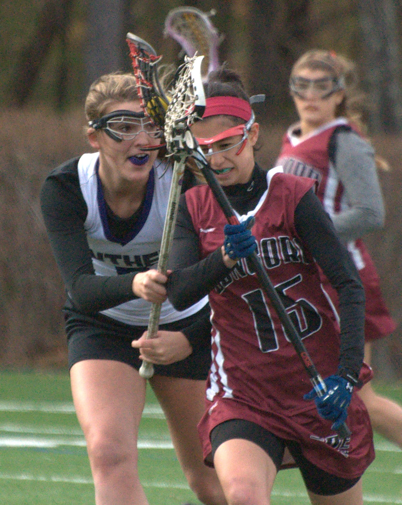 Nashua South's Maddie Coughlin tries to slow down Concord's Bella Rubin during Thursday's game.
