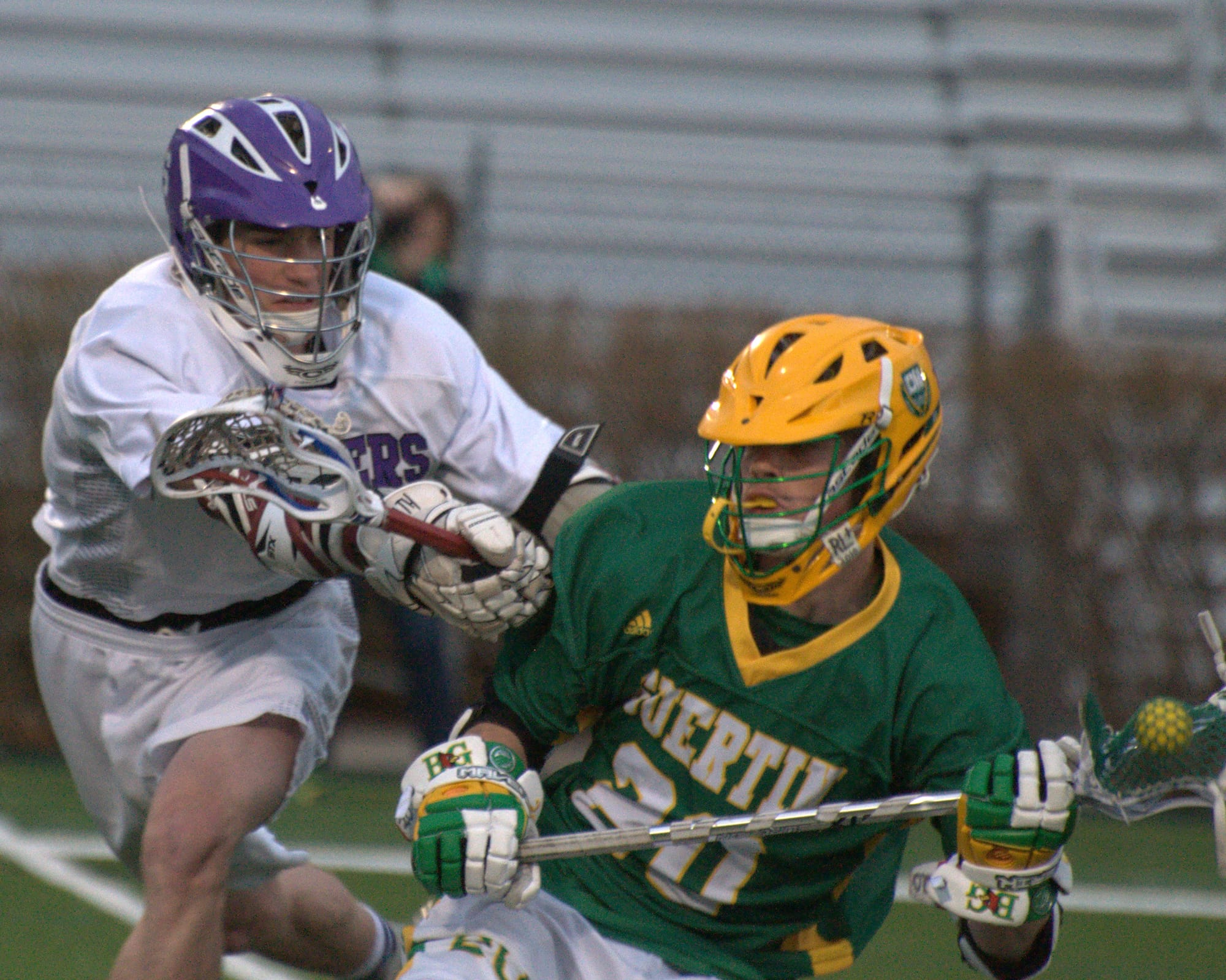 Nashua South Zachary Anzel gets in the way of Bishop Guertin's Gage Sevigny during Thursday's game.