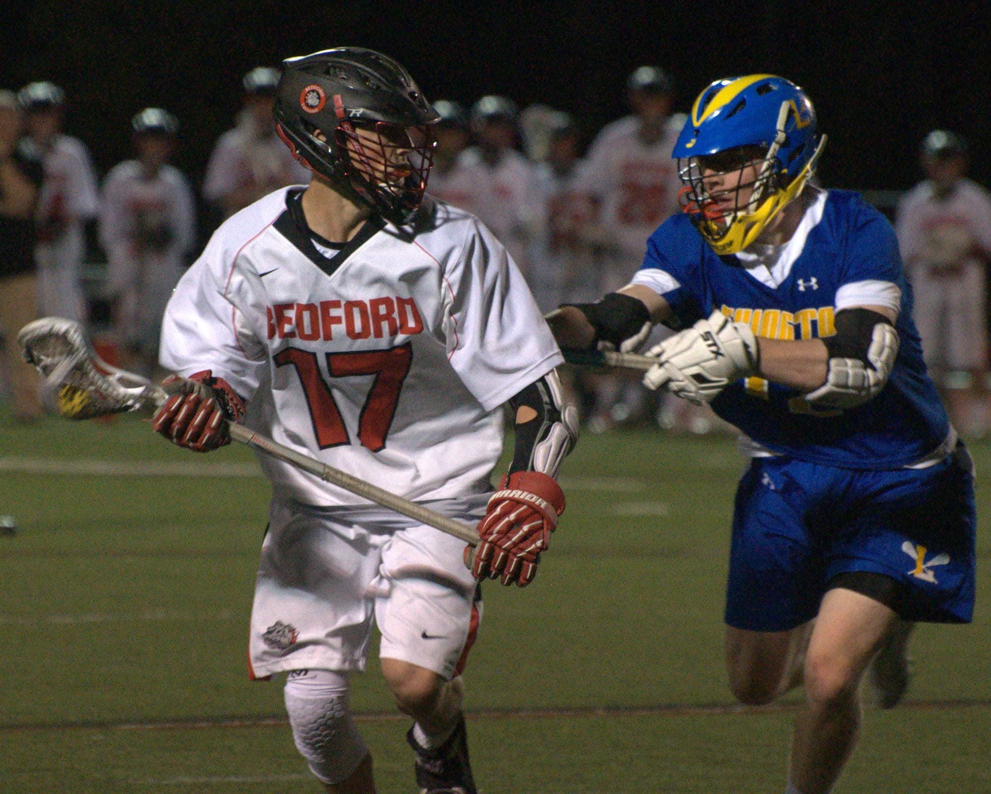 Lexington's Jack Miniutti defends against Bedford's Zachary Tucci during Saturday's game.