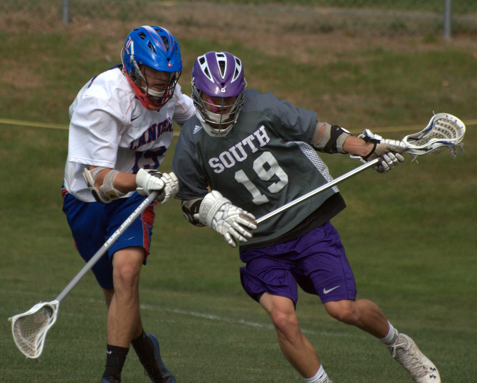 Londonderry's Nicholas Donnelly defends against Nashua South's Steven Saucier during Thursday's game.
