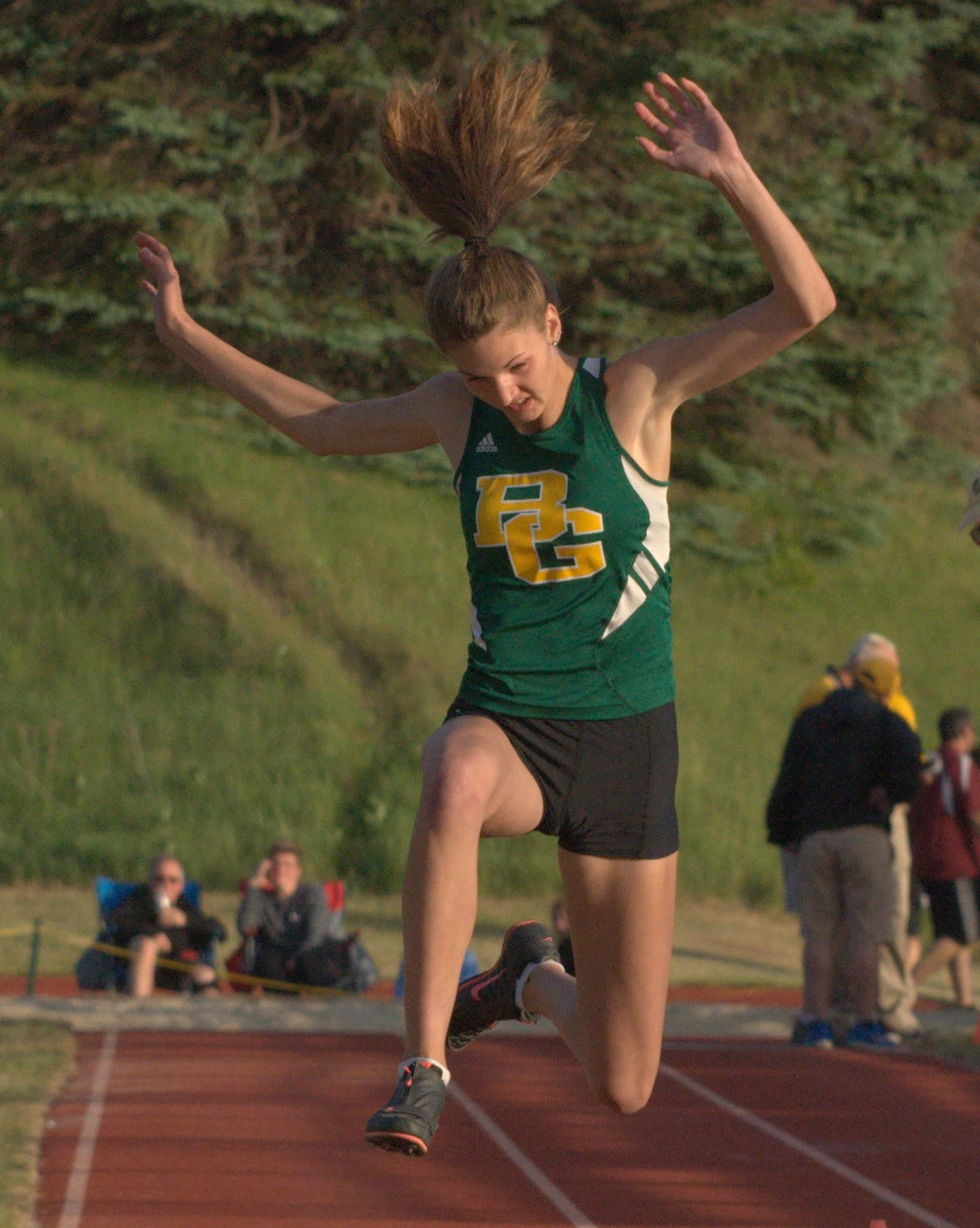 Bishop Guertin's Briana Silck competes in the triple jump.