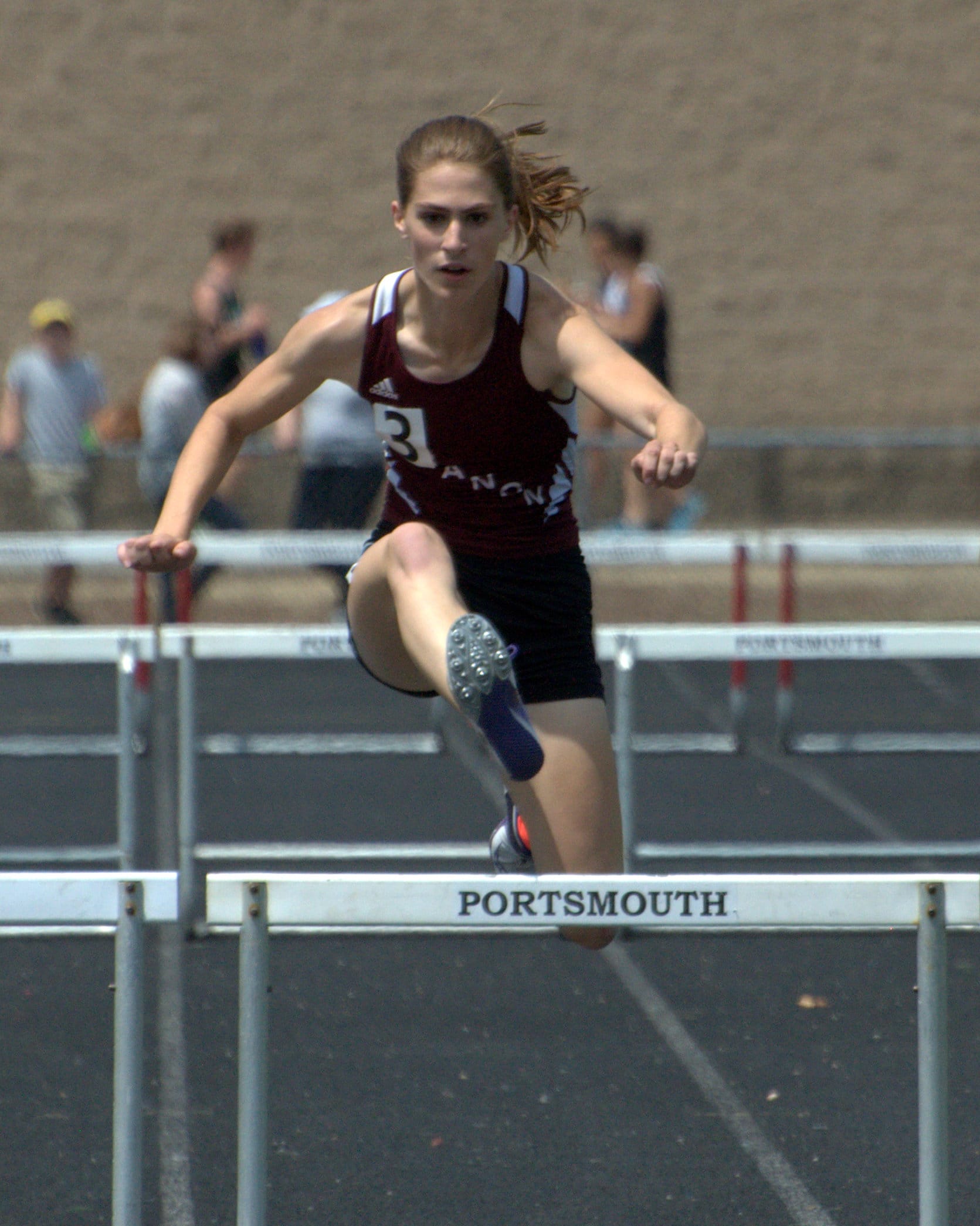 Lebanon's Corinne Kennedy clears a hurdle.