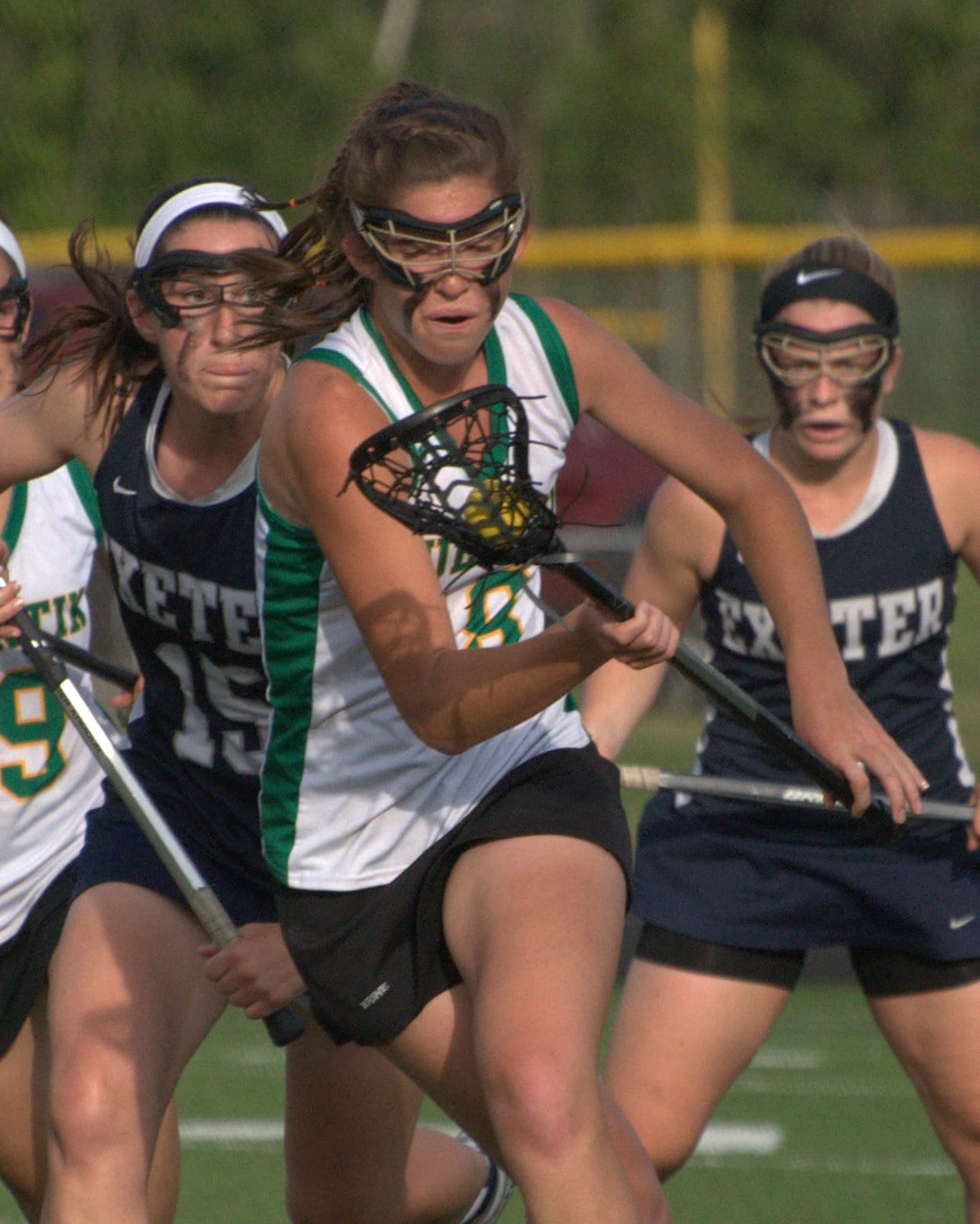 Bishop Guertin's Bryn Carroll controls the draw during Thursday's game.