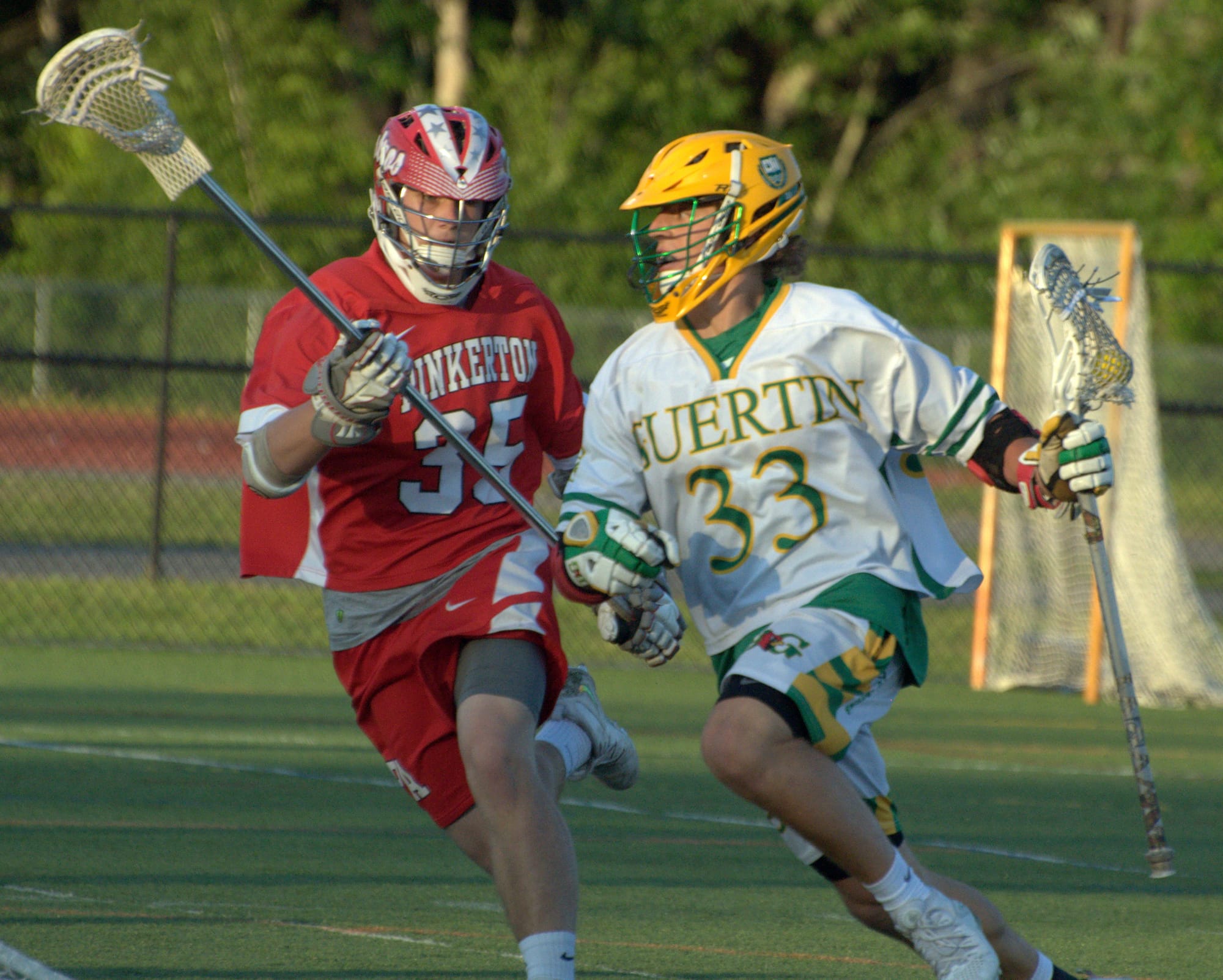 Pinkerton's Cam Richard defends Bishop Guertin's Alex Astarita.