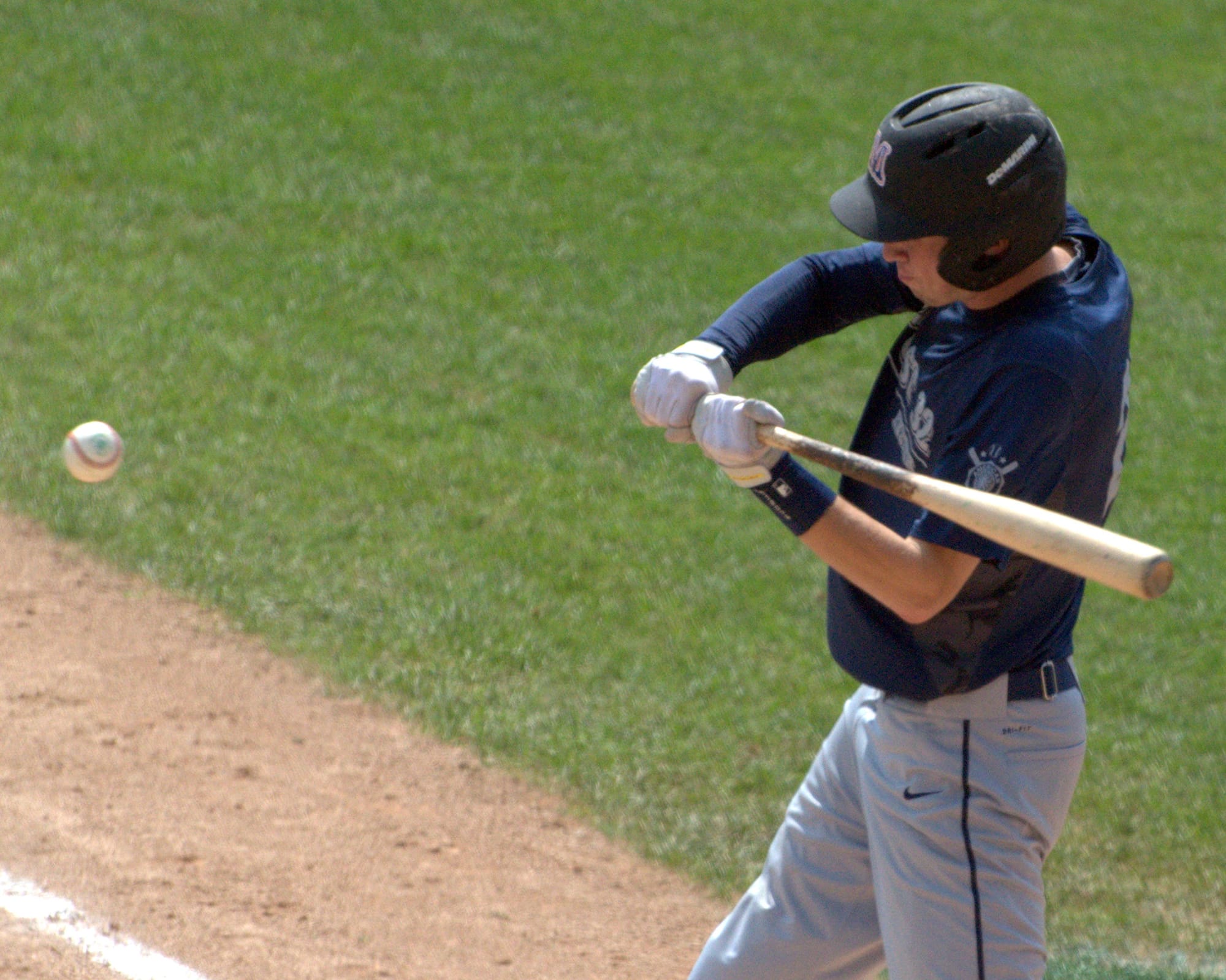 Exeter's Michael Sterritt takes a swing.