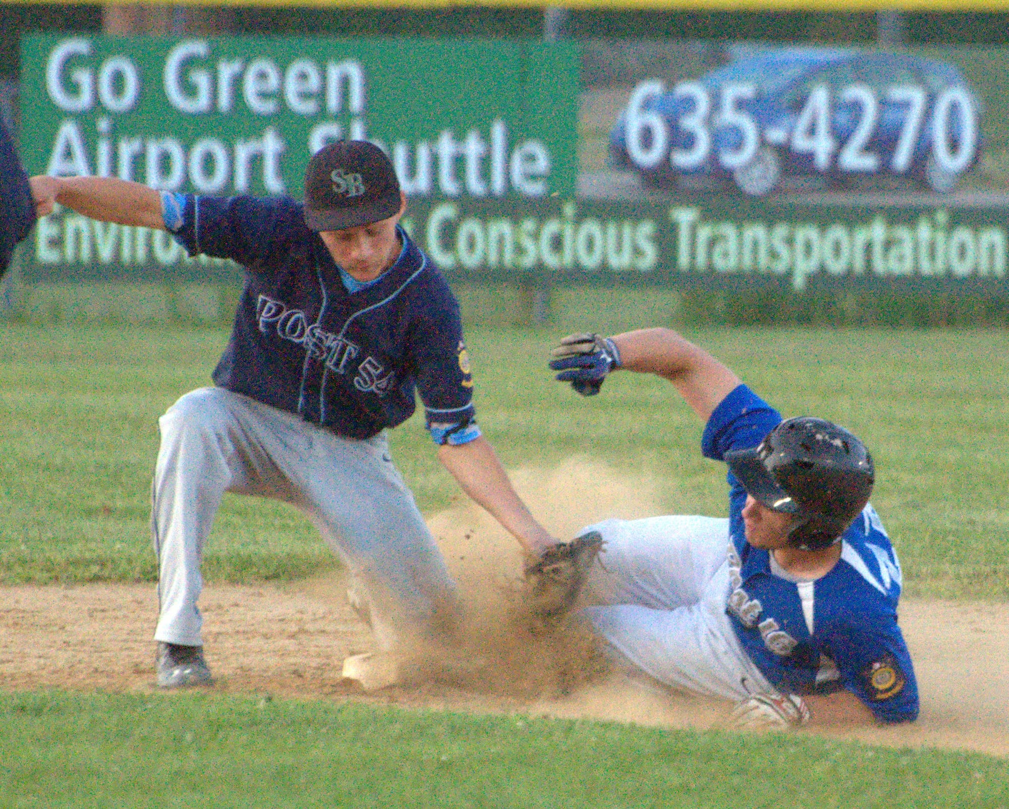 Bedford's Brian Fyfe tags out Goffstown's Brendan Hall at second base during Thursday's game.