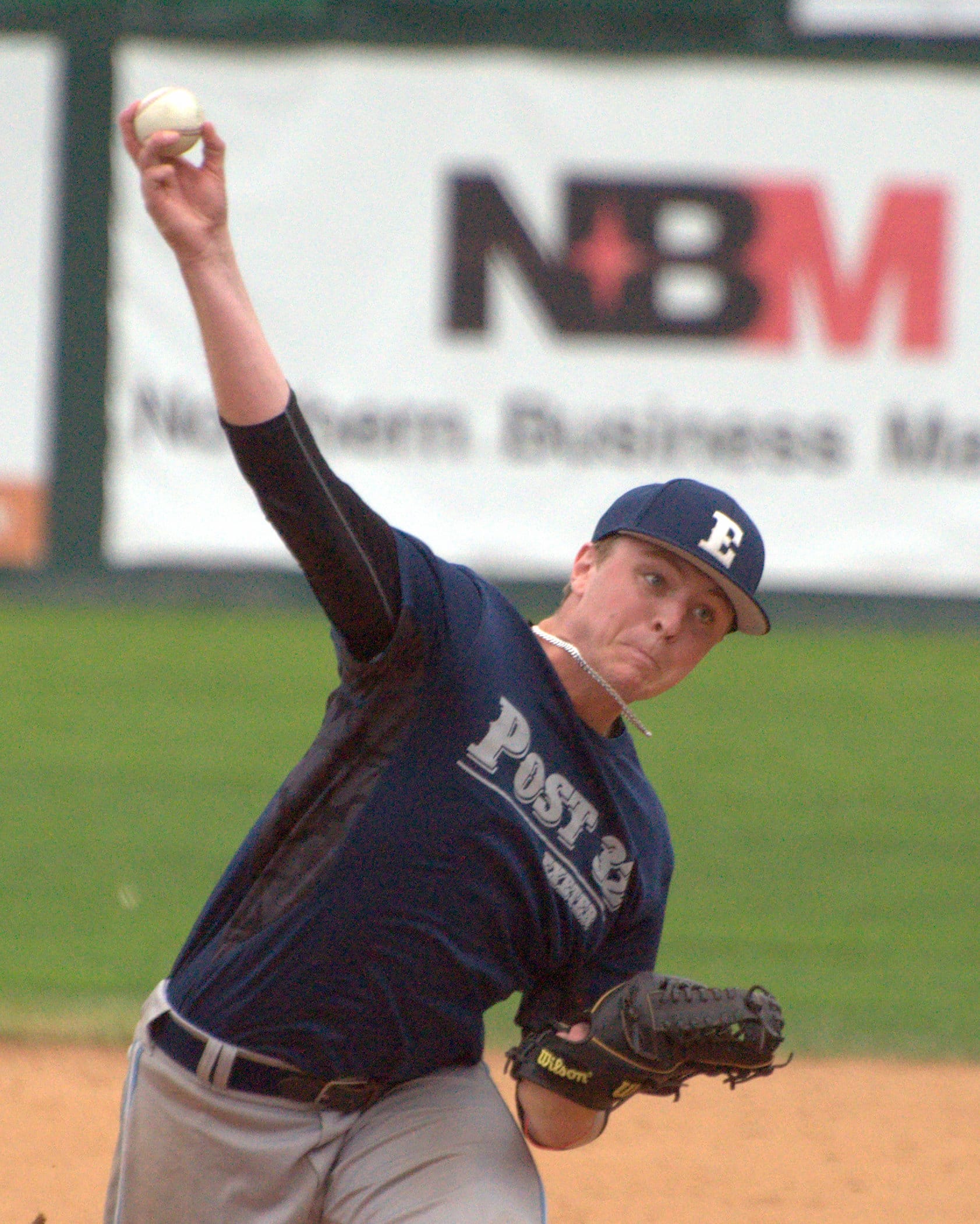 Exeter's James Mundy pitches during Saturday's game.