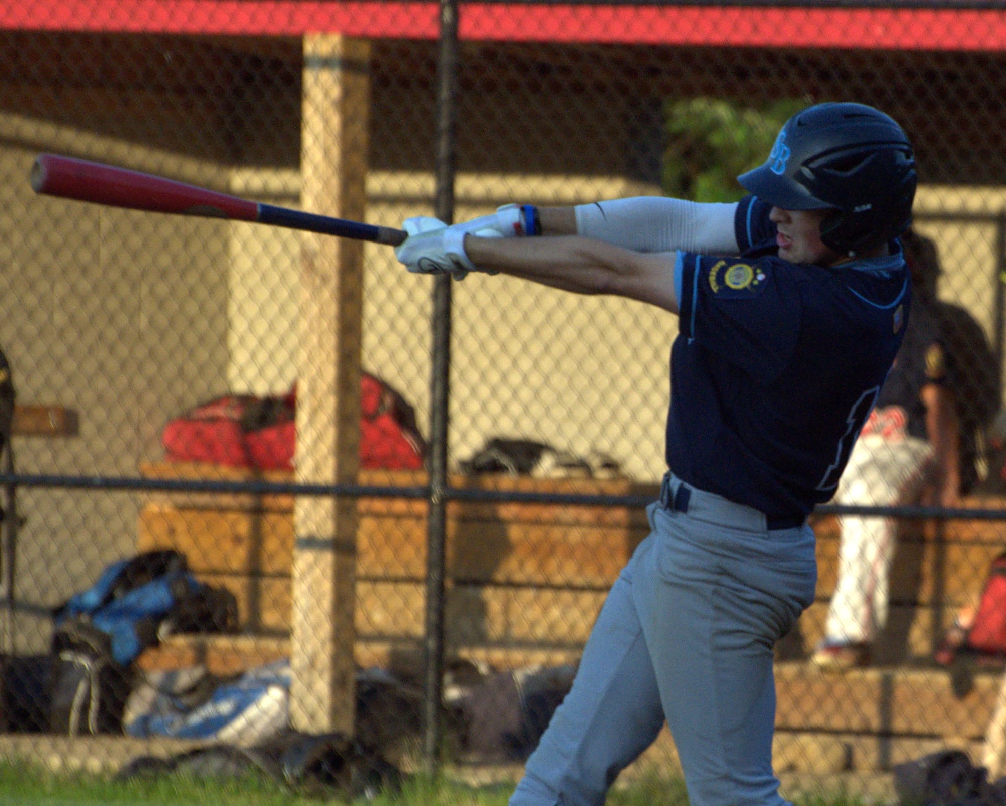 Bedford's Ryan Lang takes a swing.