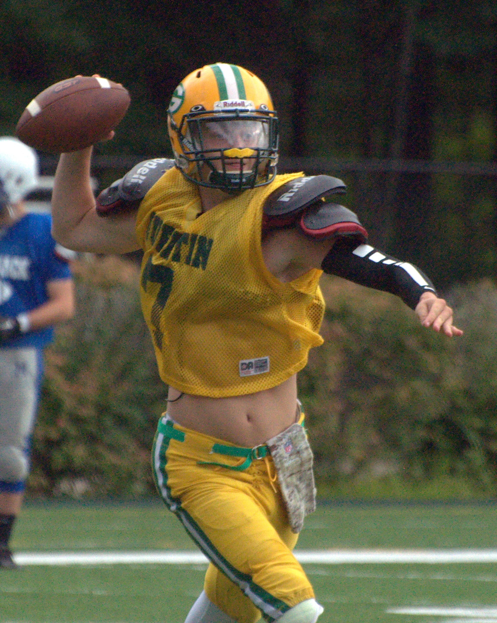 Bishop Guertin's J.T. Hiscoe throws a pass during a scrimmage against Merrimack.